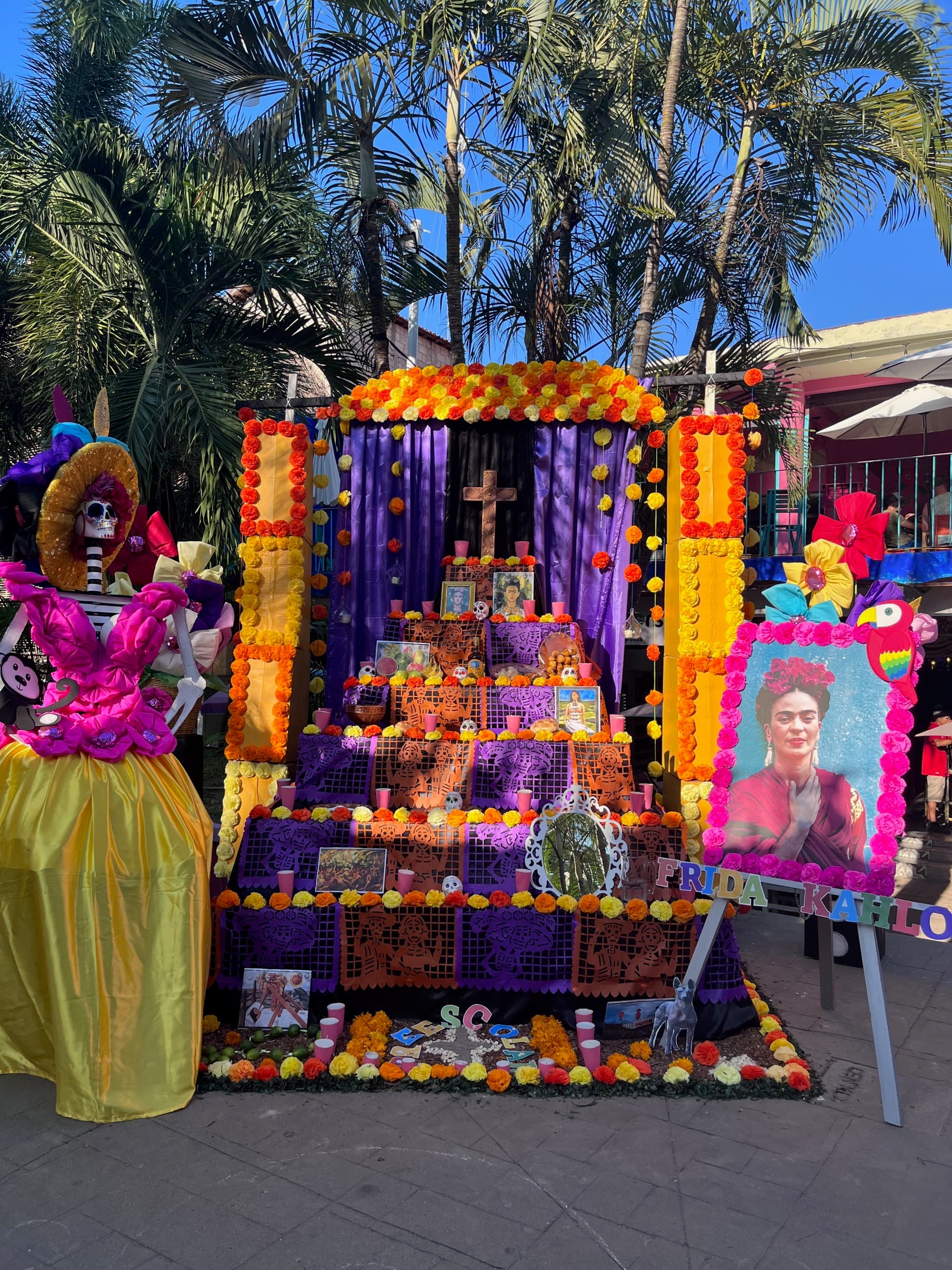 A colorful cultural display set up outside during the daytime