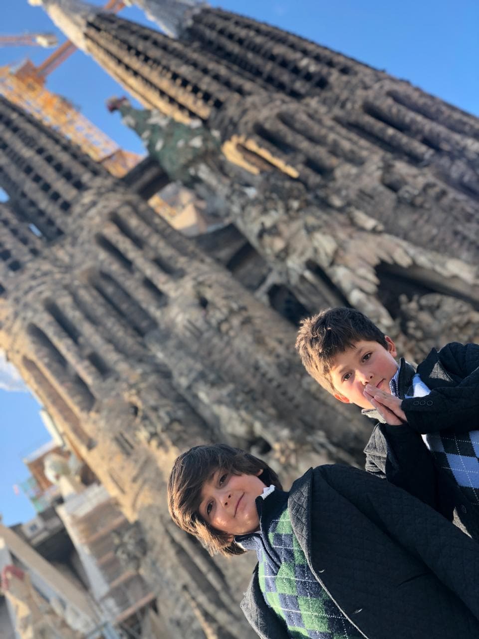 Kids with the Sagrada Familia in the background.