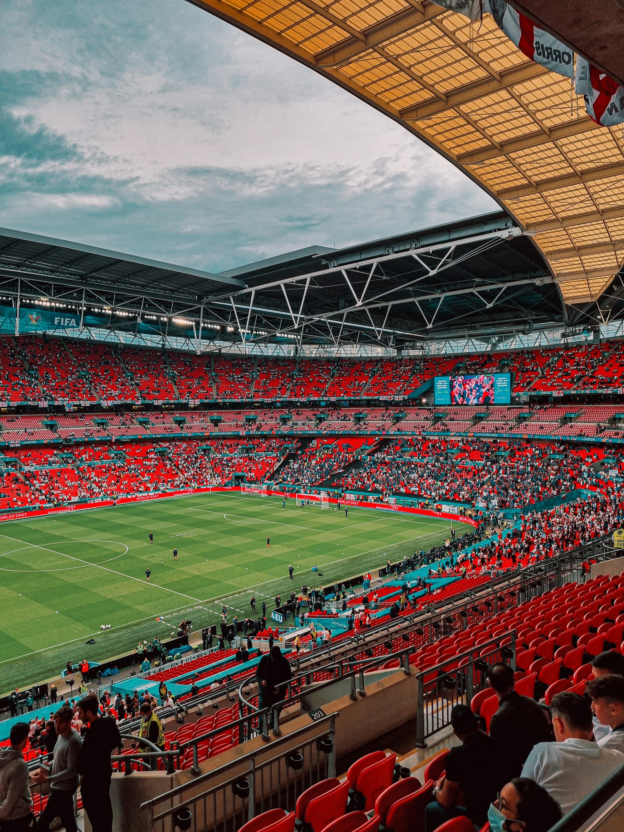 People watching a football game at Wembley Stadium - London, UK