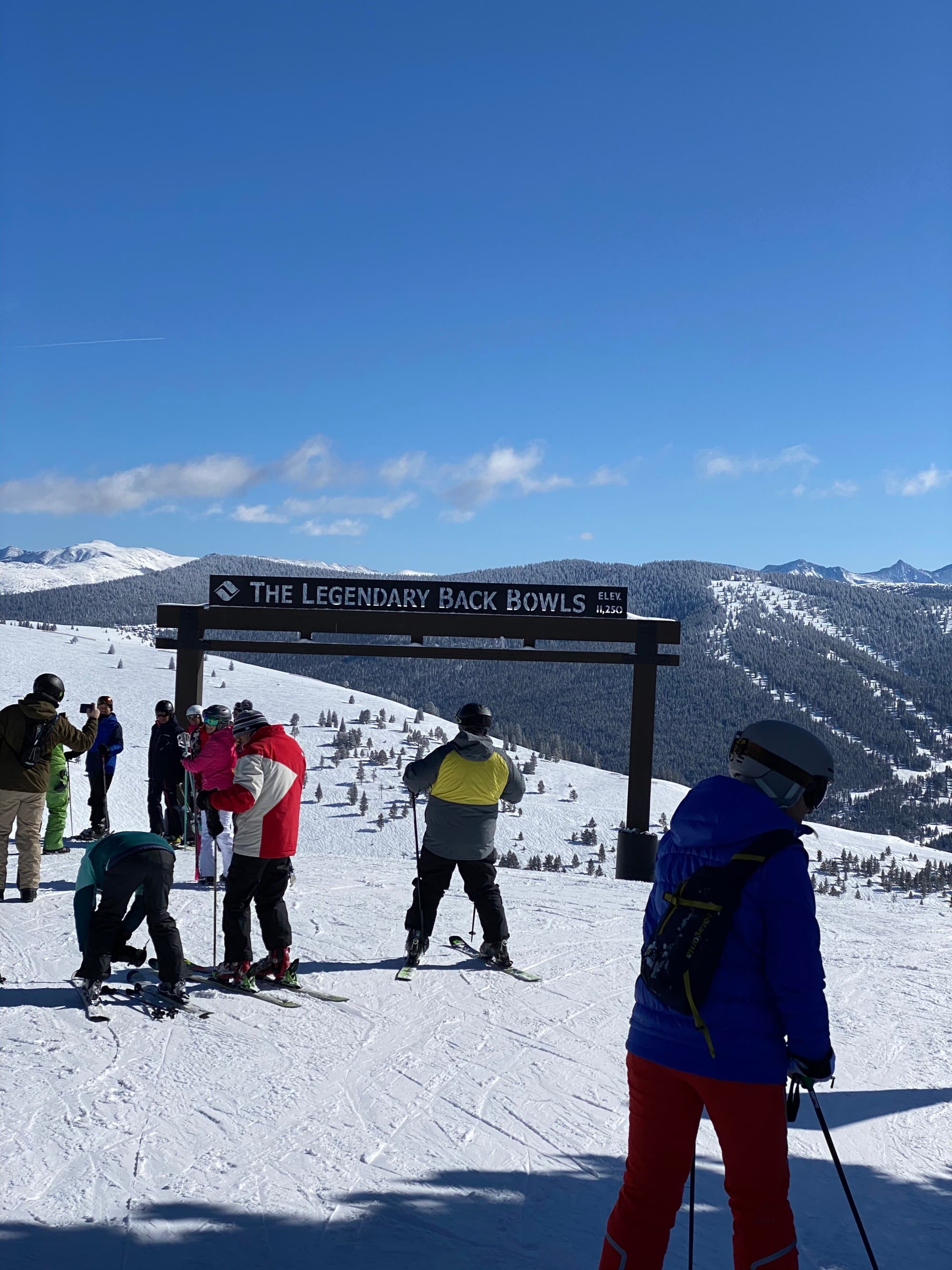 People skiing on a snow-covered hill