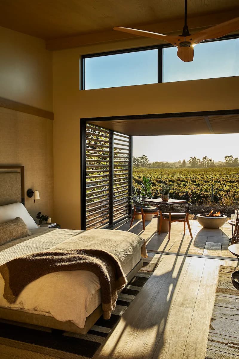 Stanly ranch room has a gorgeous winery view overlooking rows and rows of grapes on a sunny day.