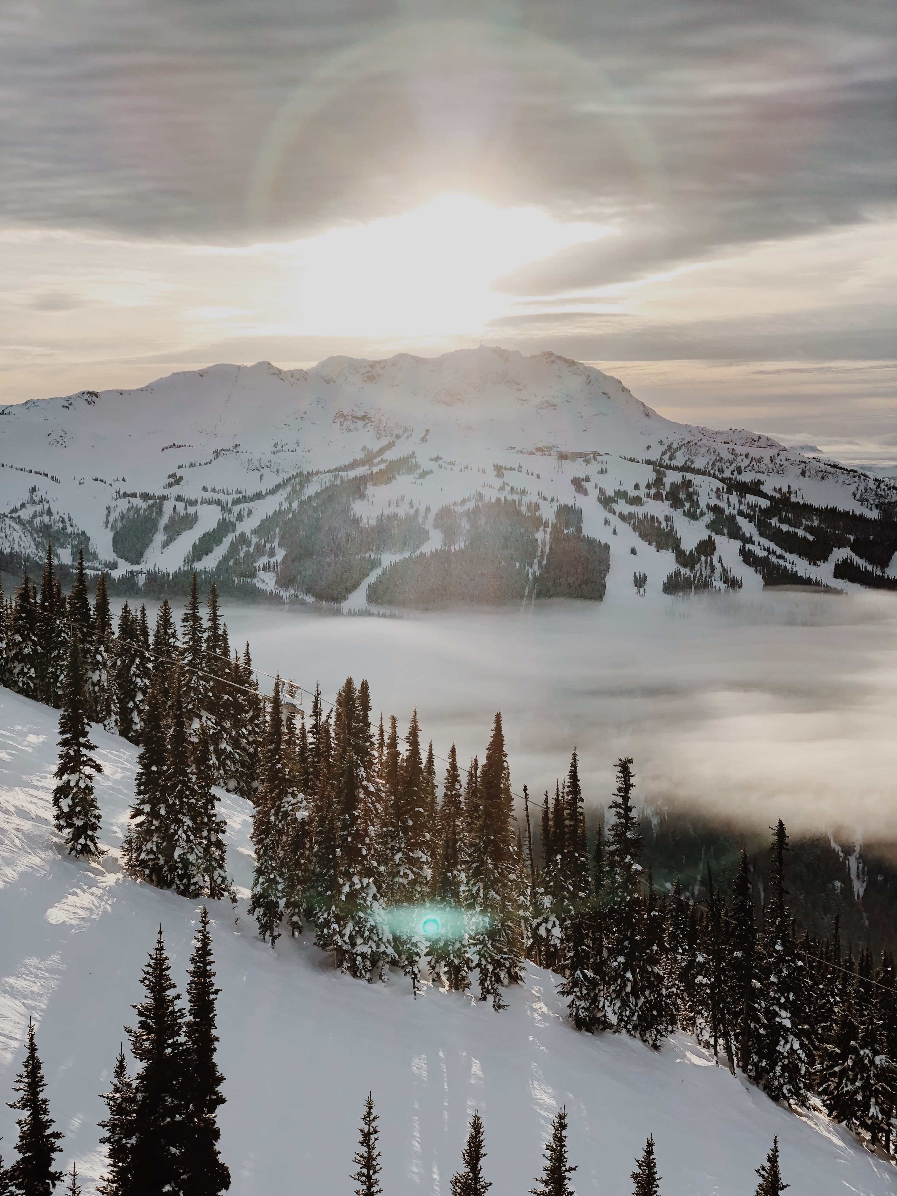 white snow-capped mountains during sunrise