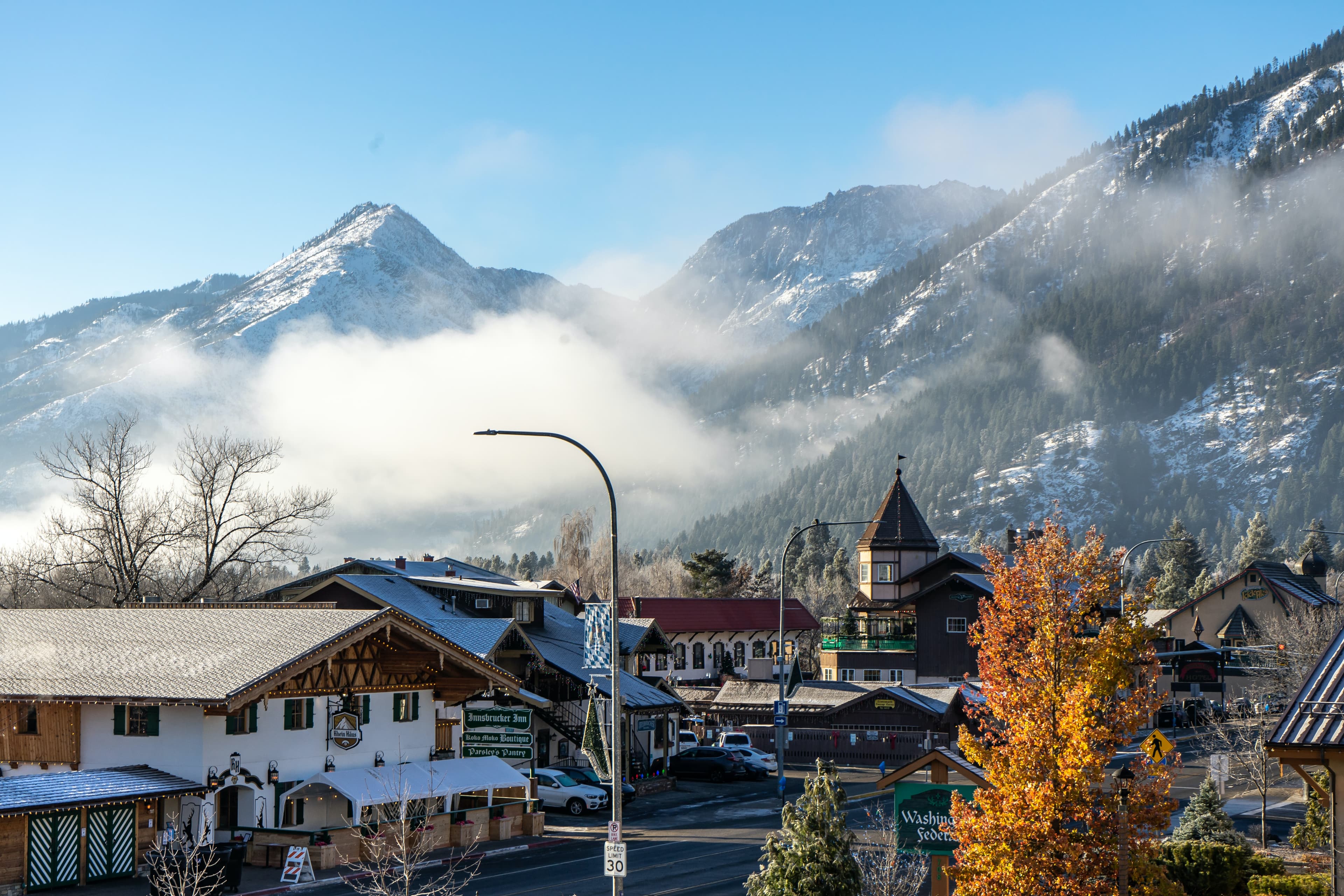 Buildings and street with mountains in background