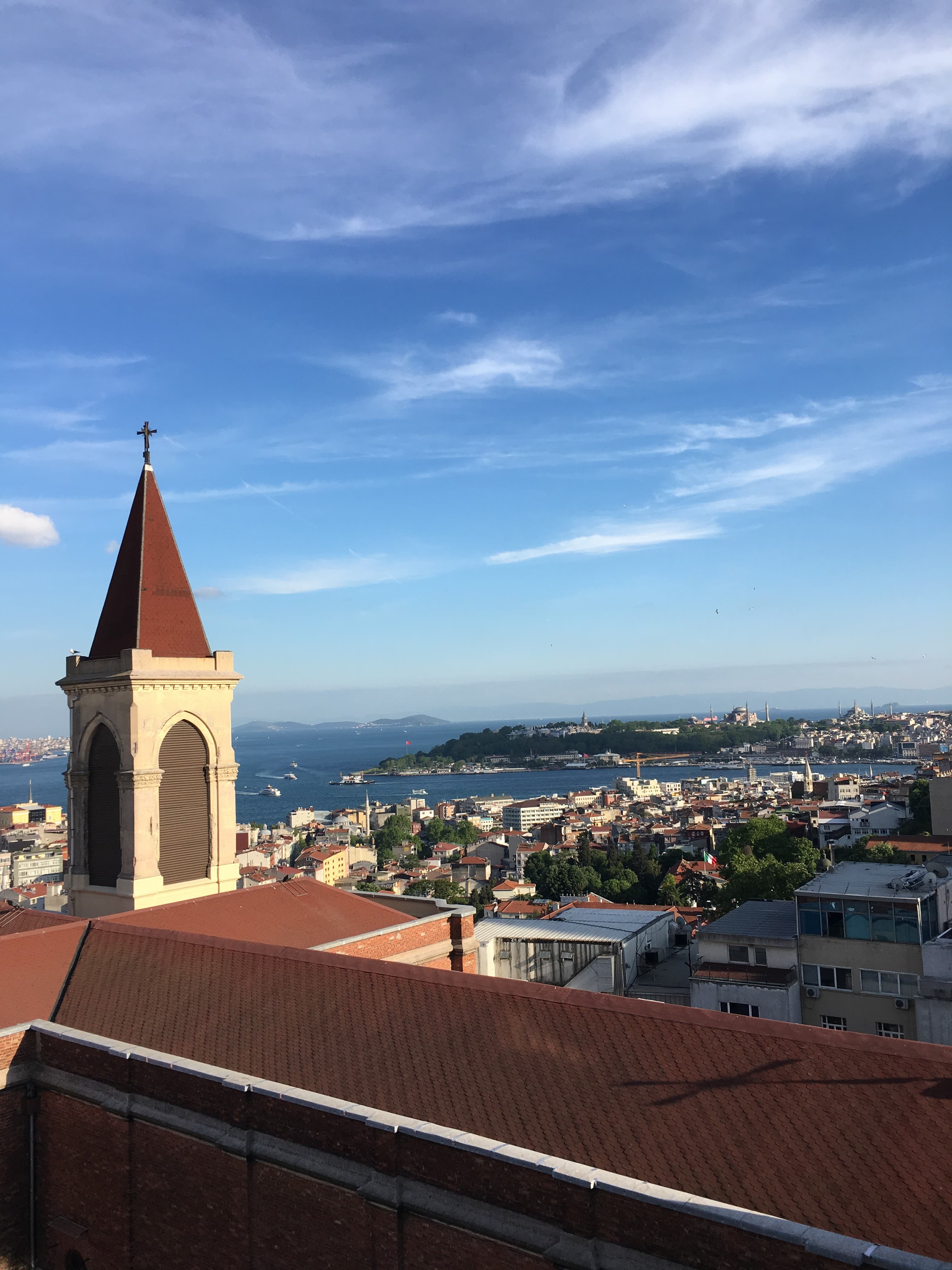 building overlooking city and the ocean during daytime