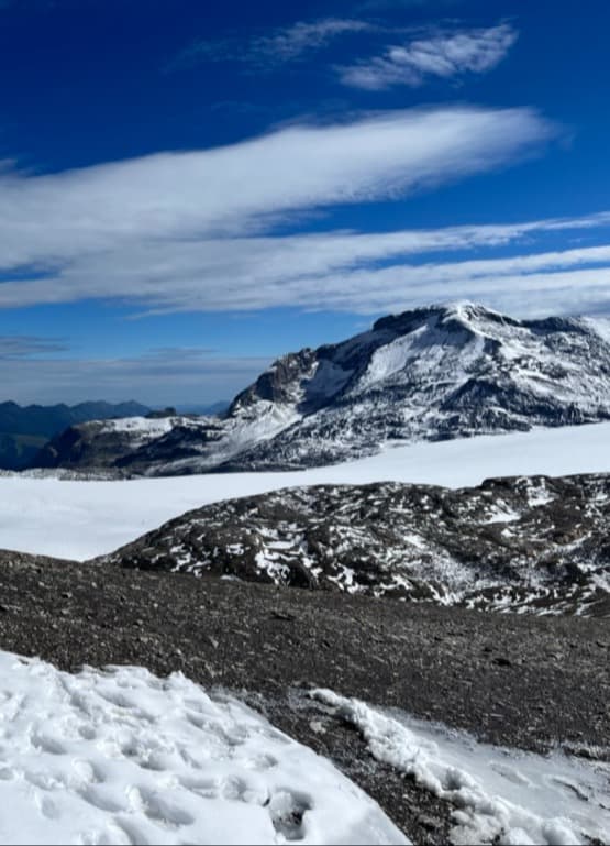 The top of a snow-covered mountain