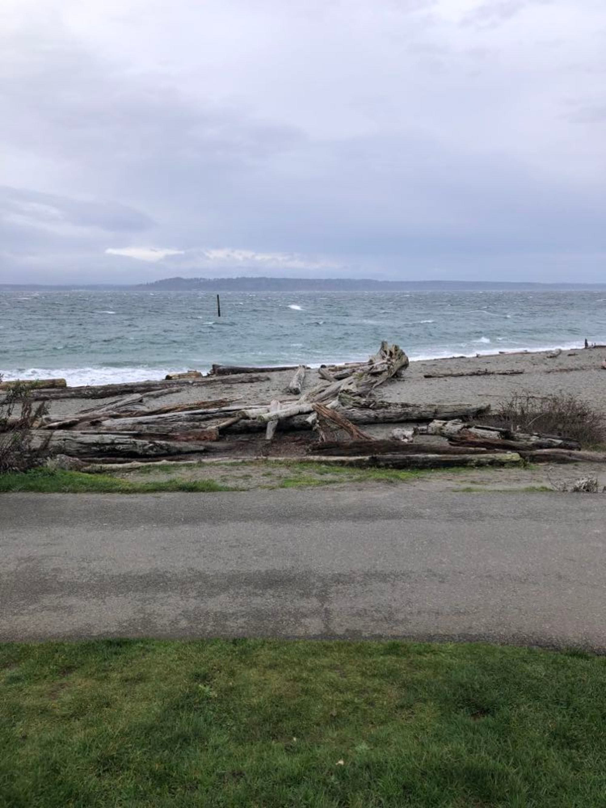 A picture taken from a far of the beach during daytime.