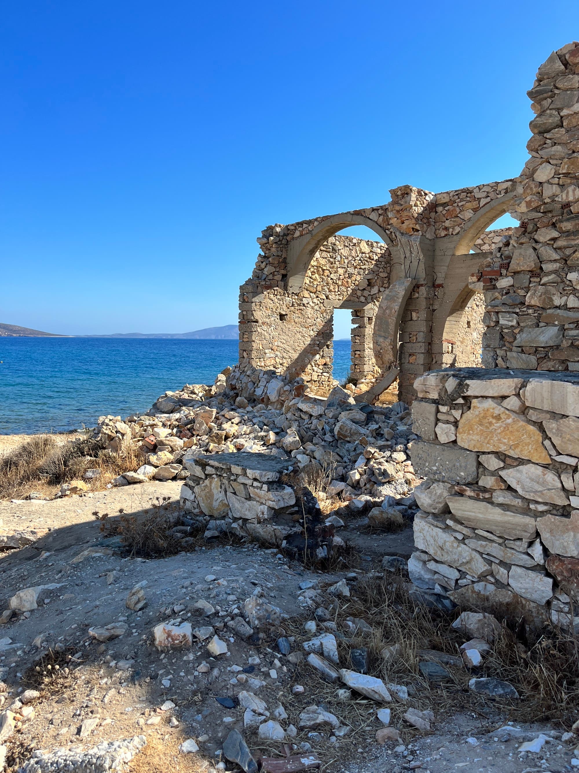 A beach with old ruins.