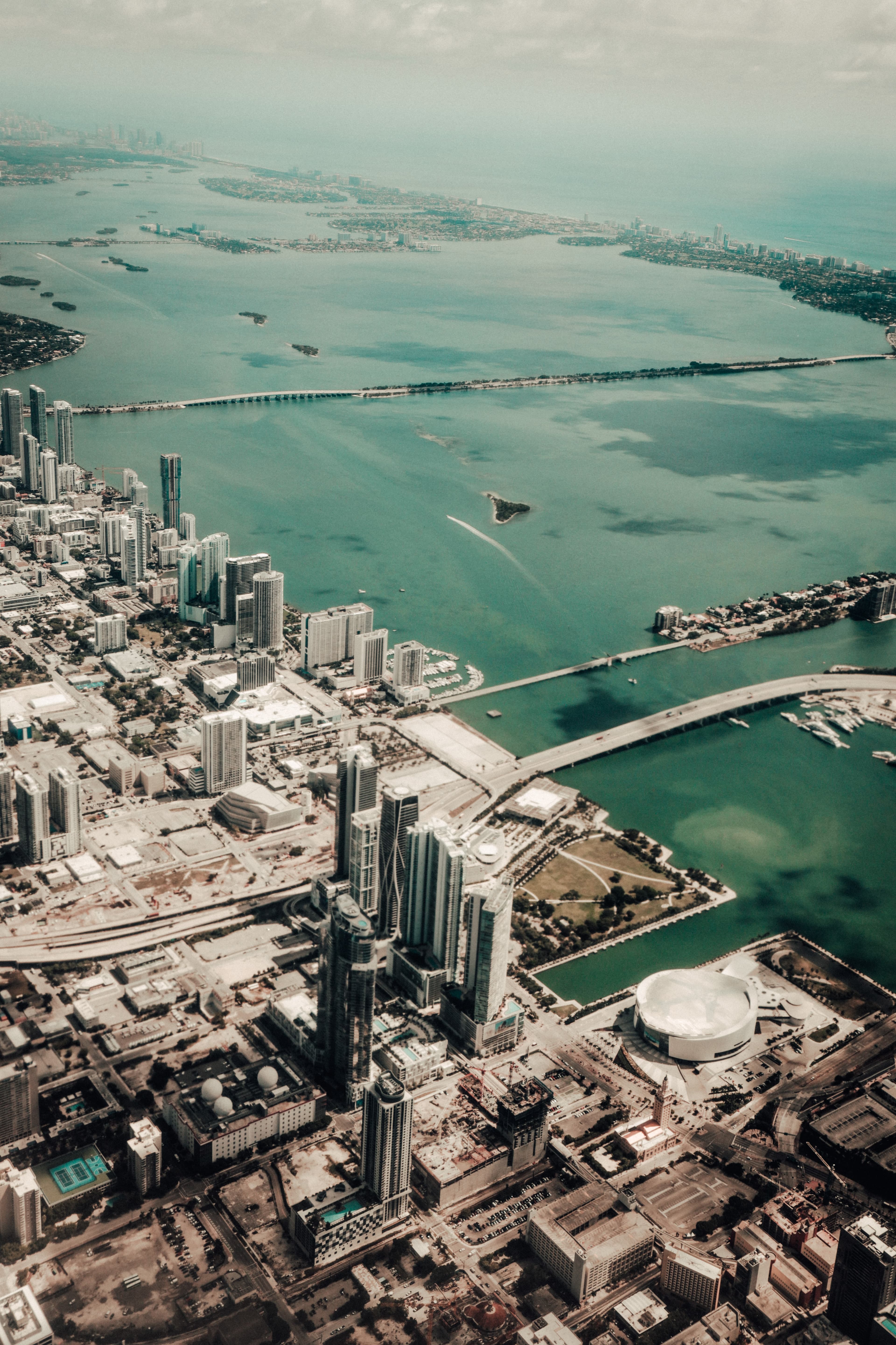 An arial shot of  Fort Lauderdale with high rise buildings on the seashore.