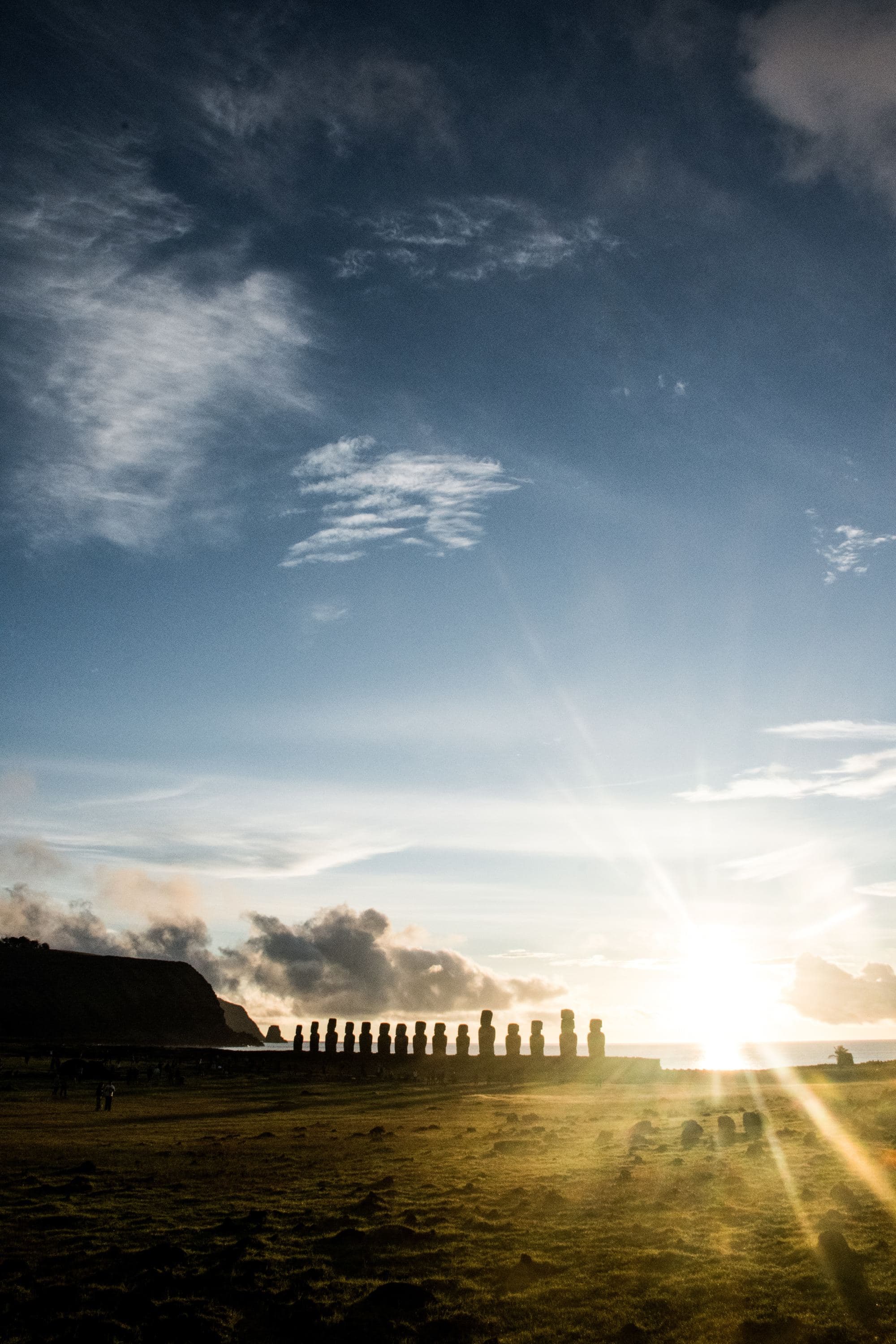 stone statues on grass feild