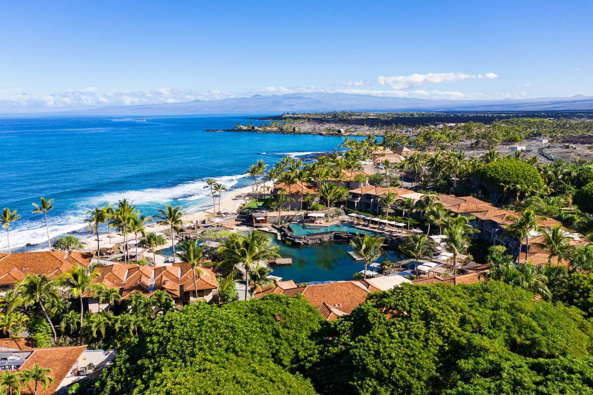 aerial view of buildings and the ocean