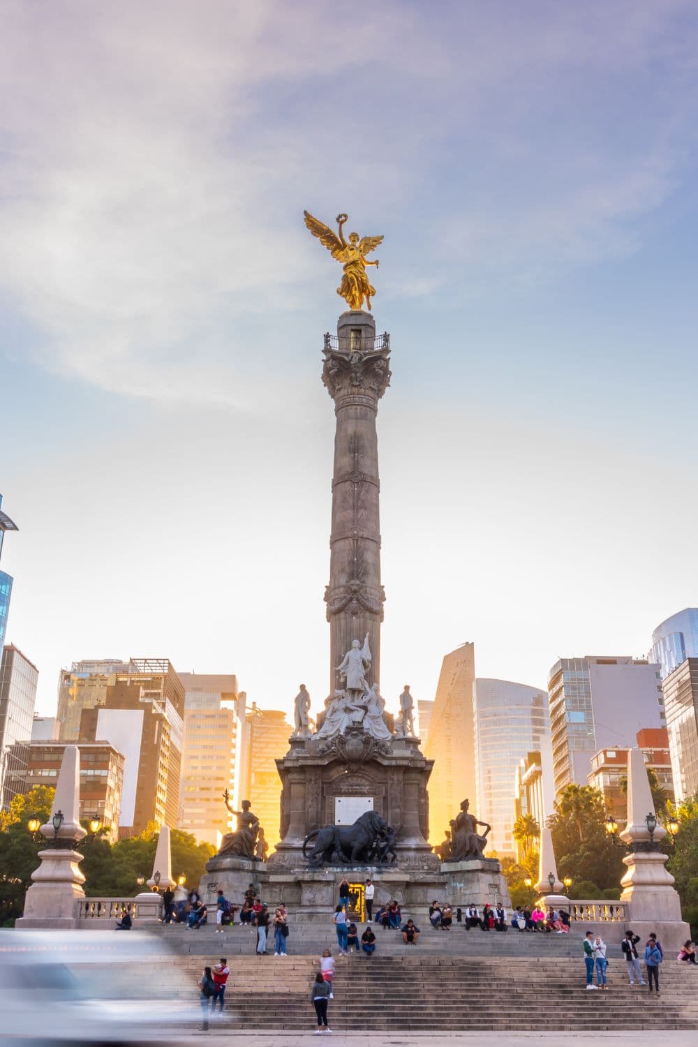 Statue with a beautiful gold angel at the top.