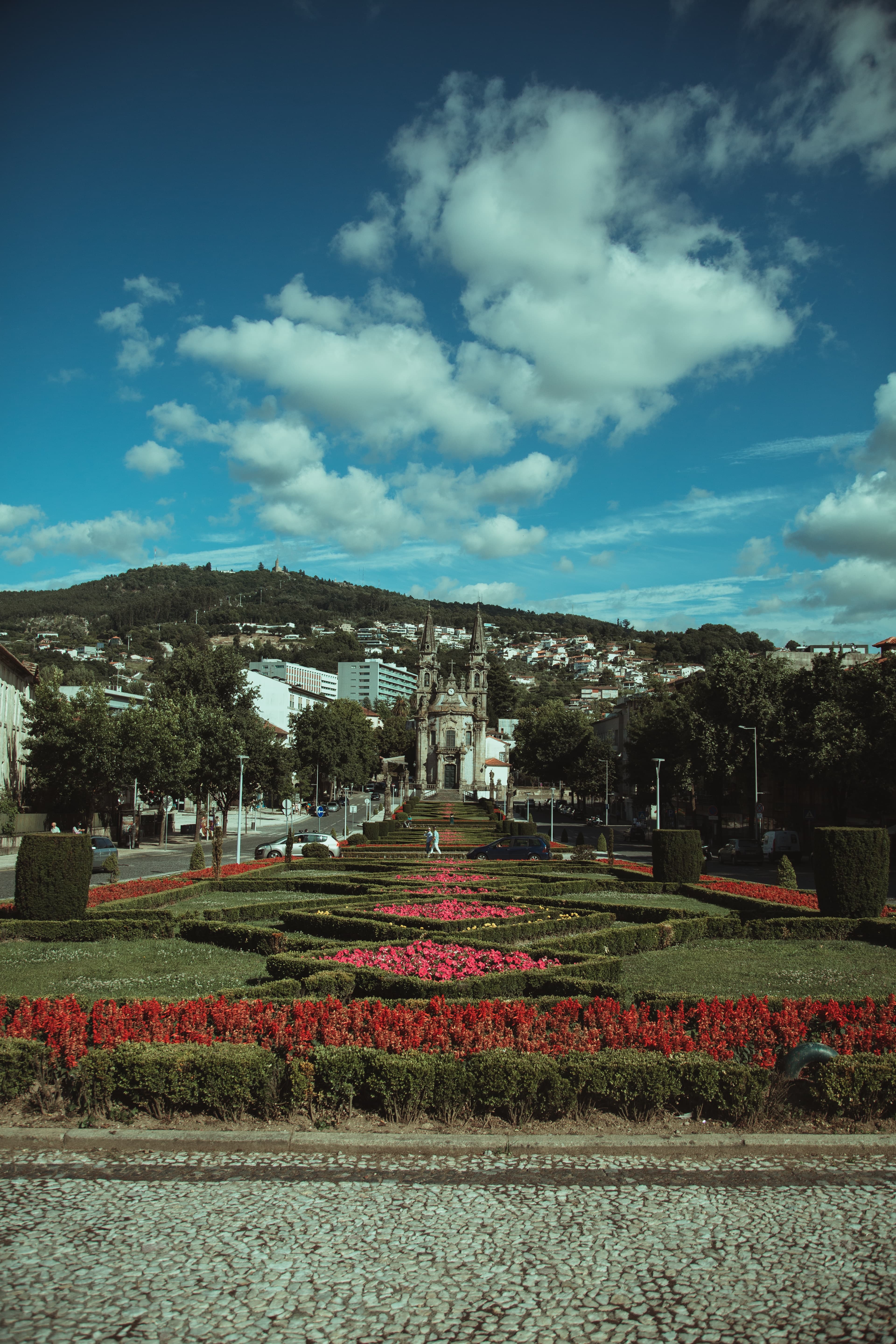 large garden with a building in the background