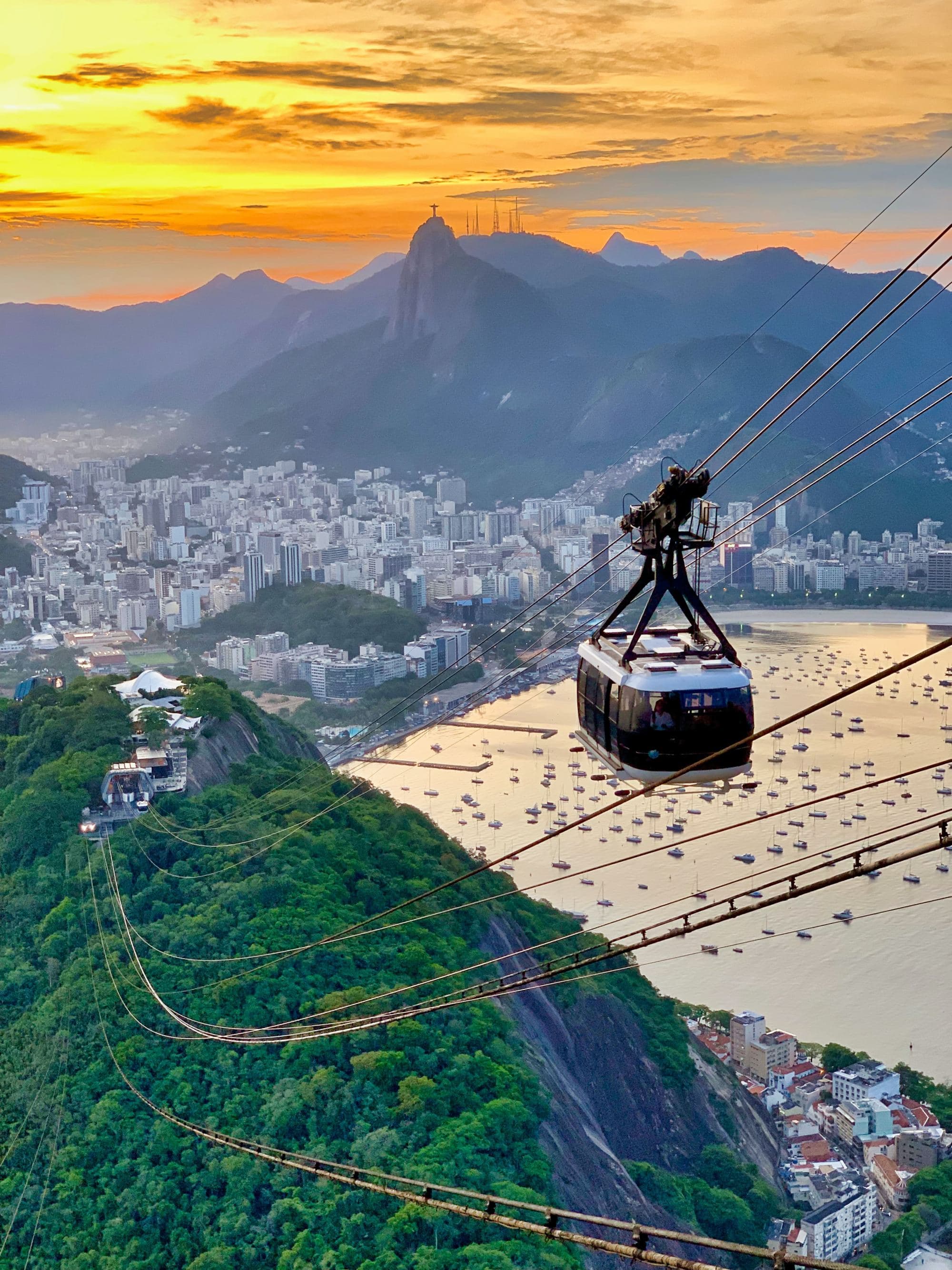 A picture of a cable car picture in the daytime.