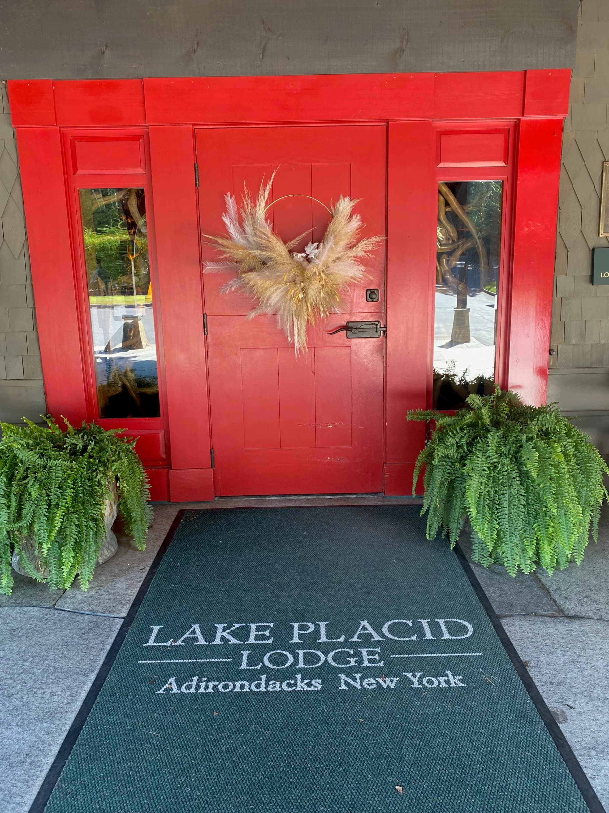 Red door of Lake Placid Lodge.