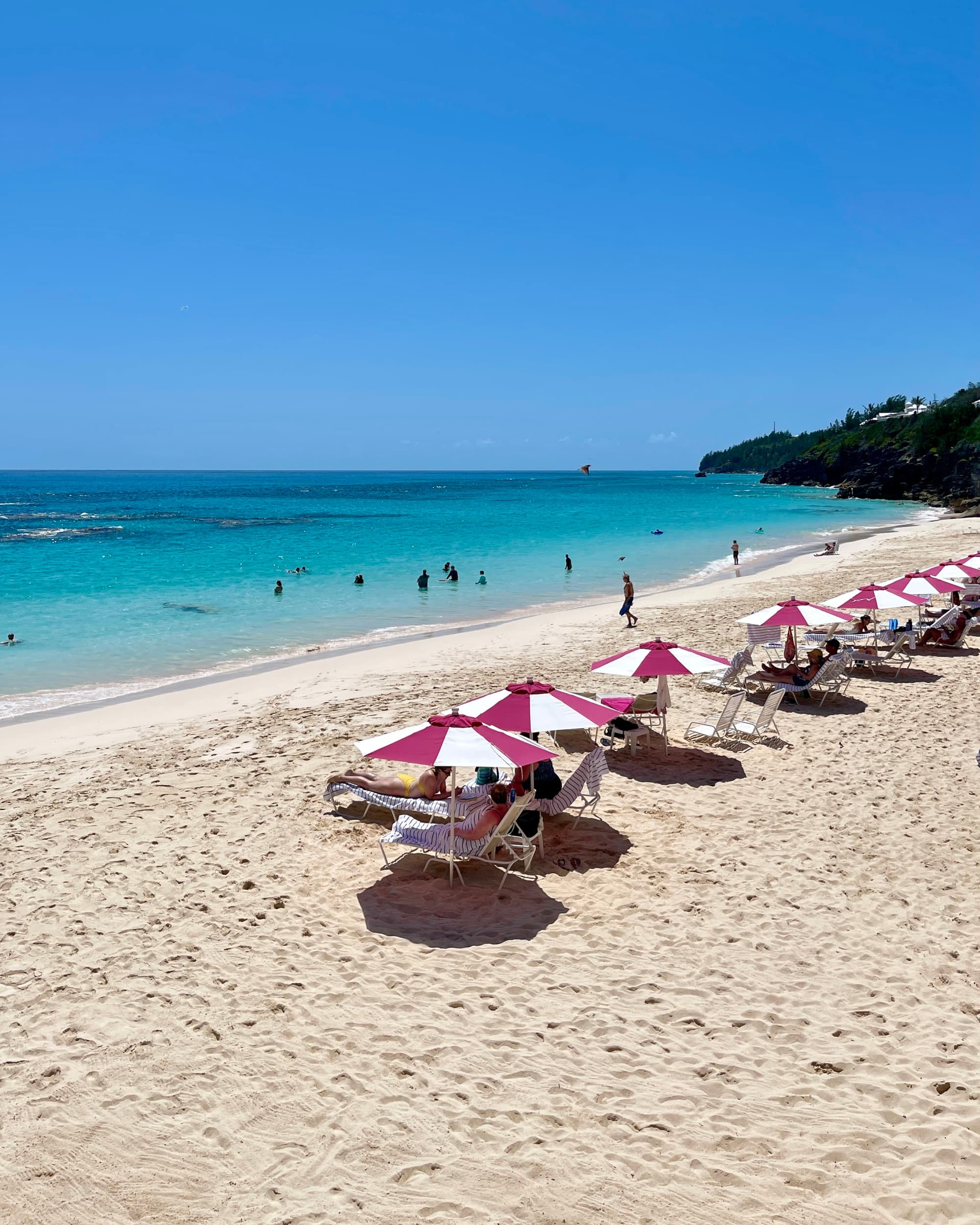 Beach with beach umbrellas.