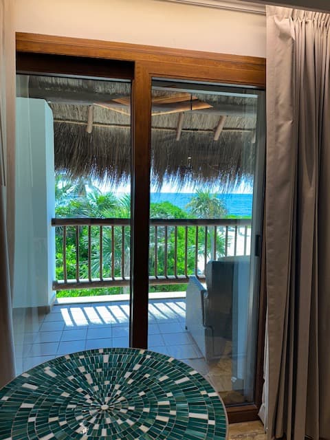 Balcony view of the beach on a sunny day.