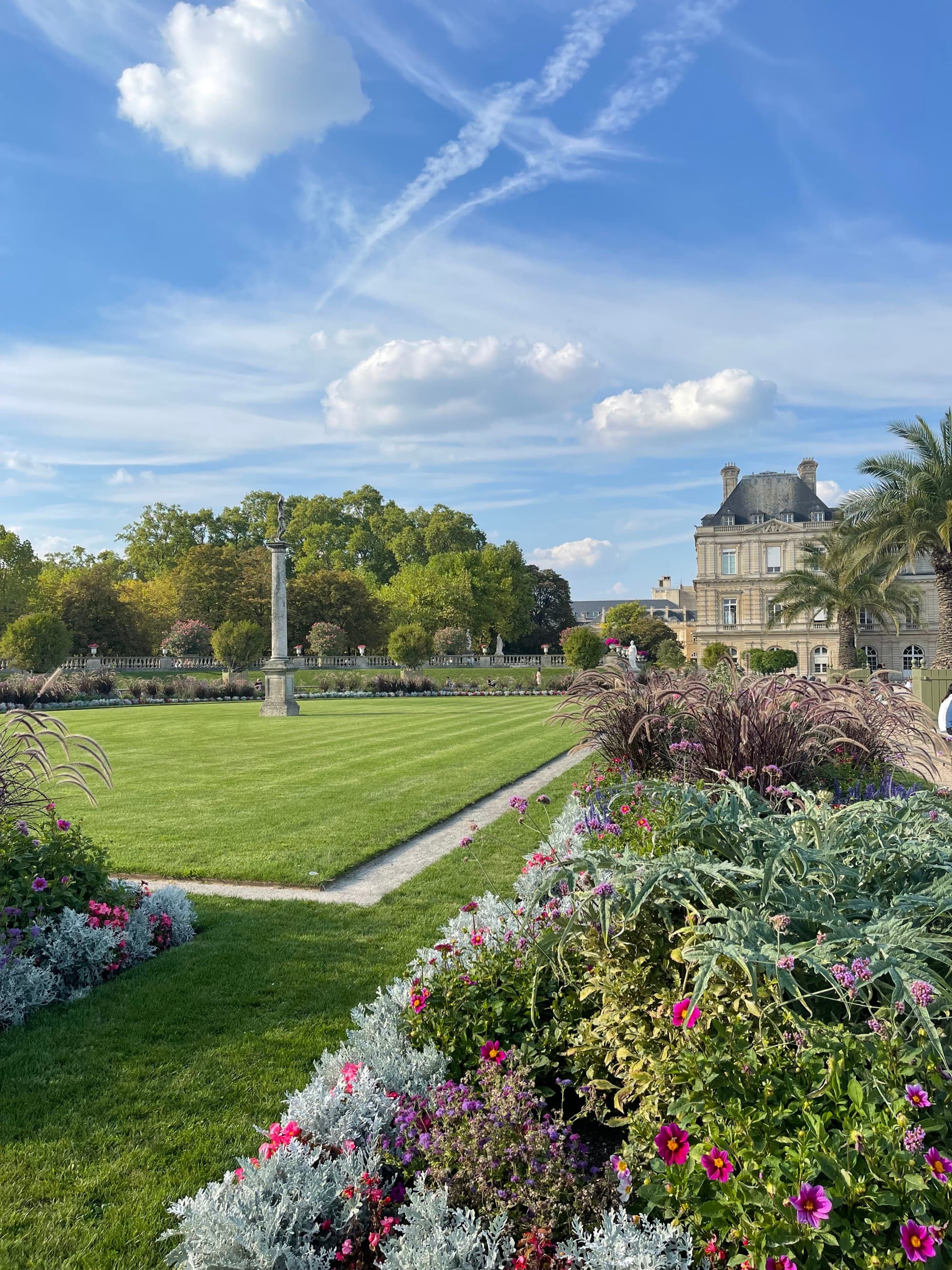 Beautiful garden in front of a grand building