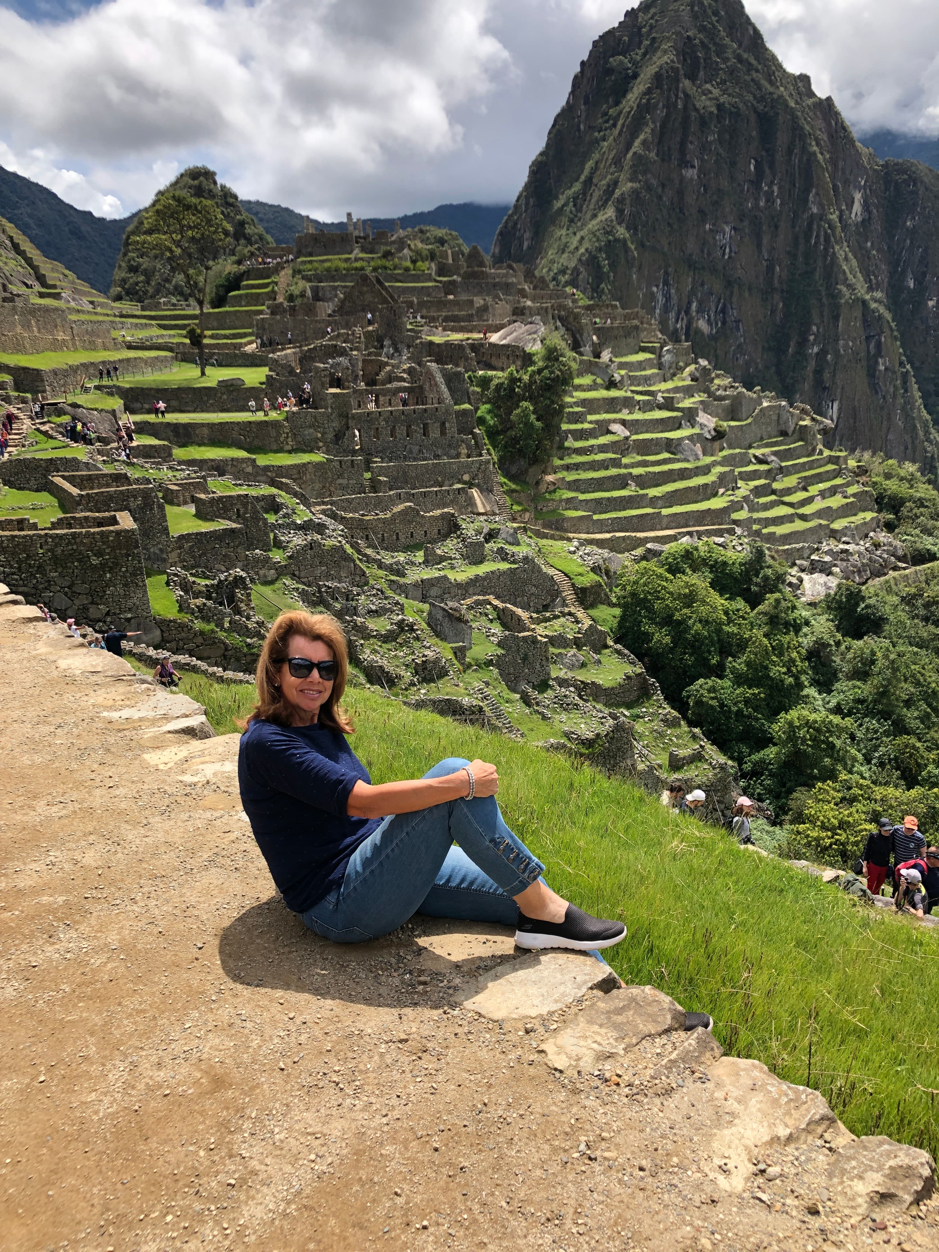 Travel advisor Diana poses with Machu Picchu in the background.