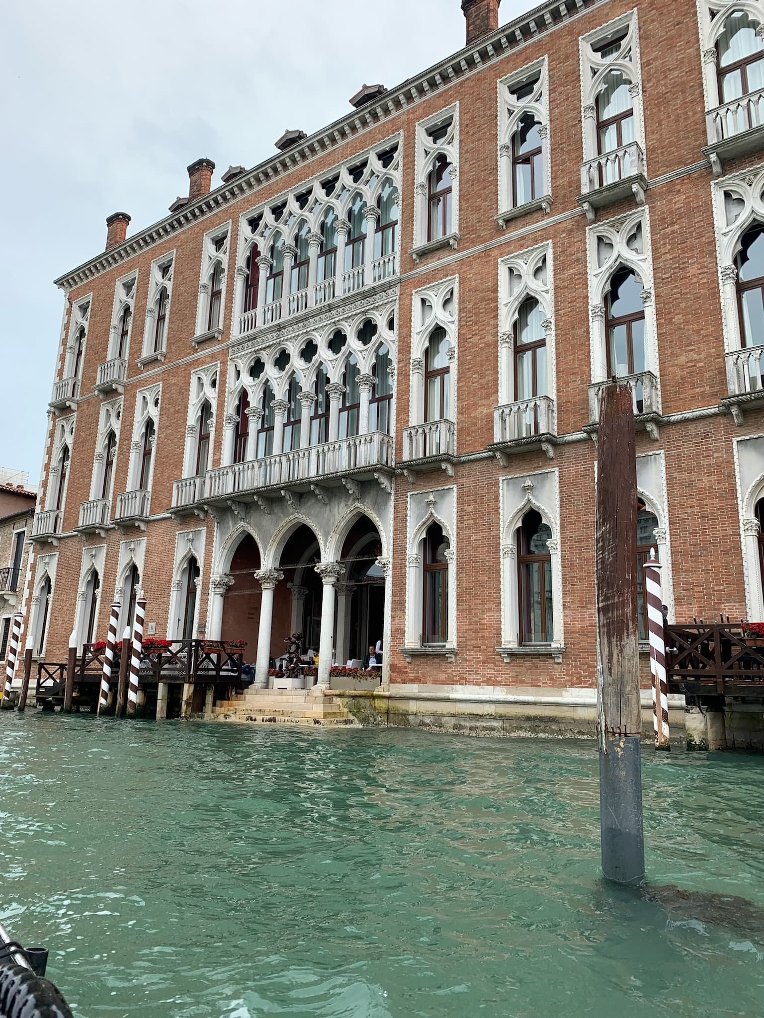 City canal in front of a building.