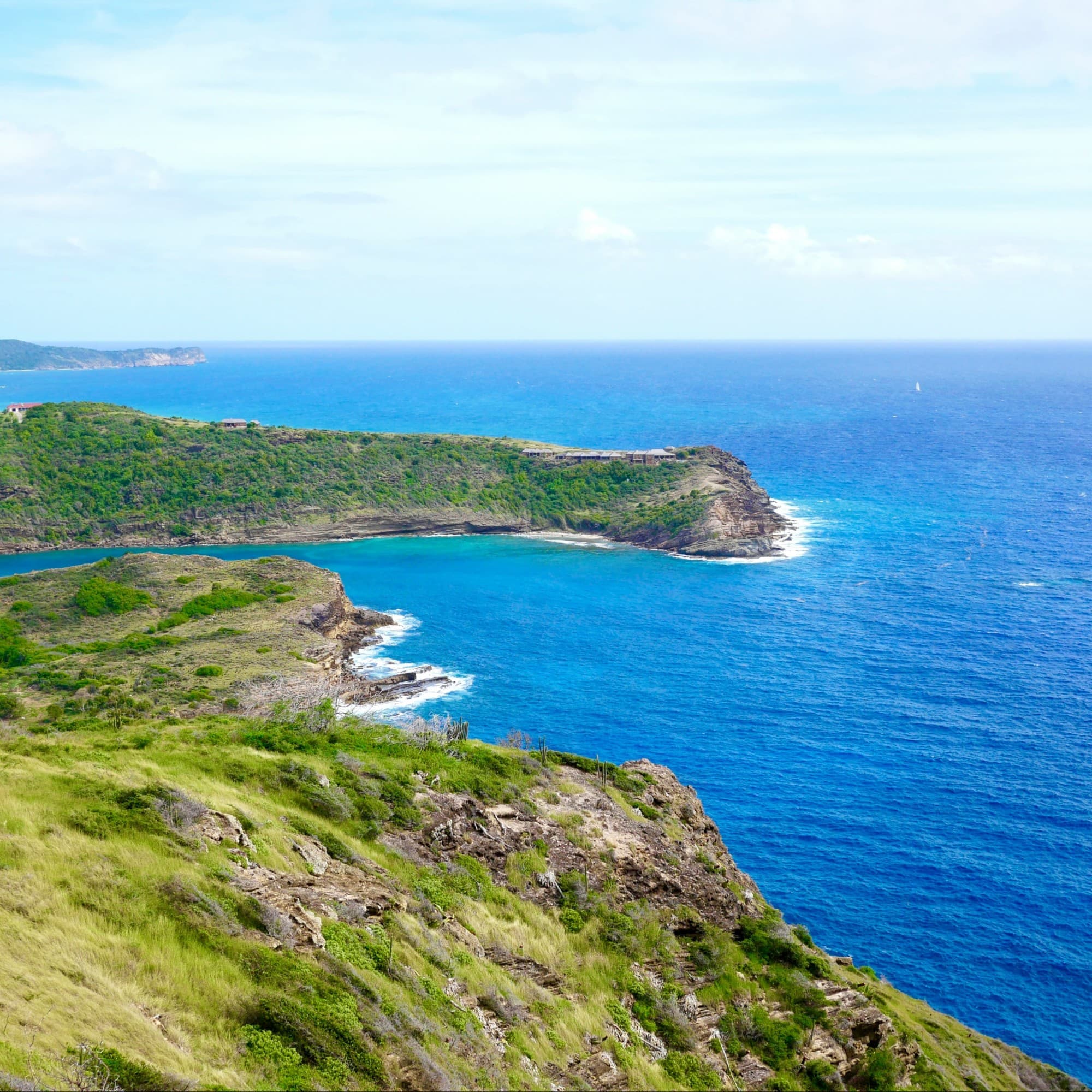 A picture of the Island surrounded by blue water.