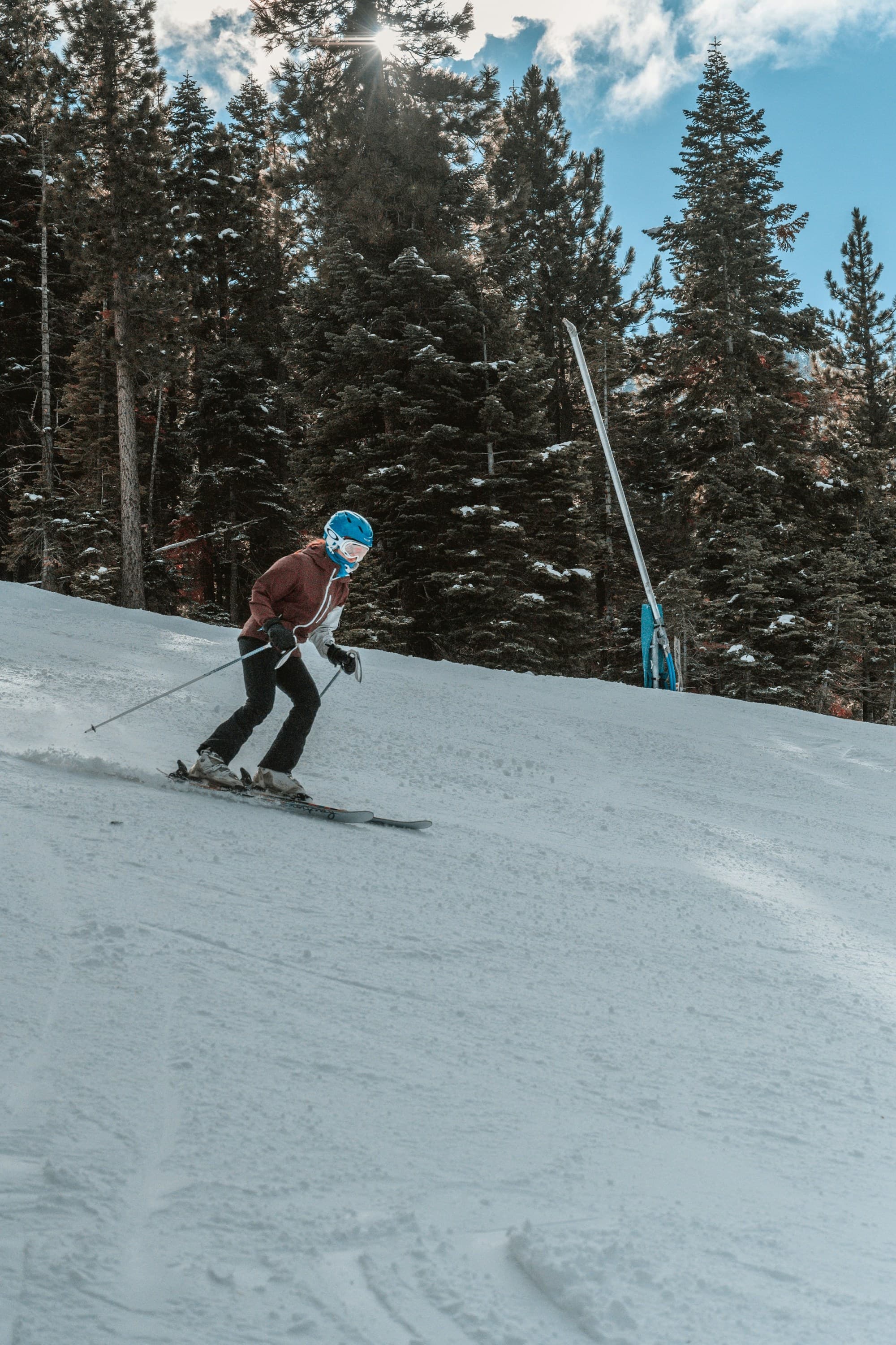 A person skiing on snow covered ground during daytime at North Lake Tahoe.