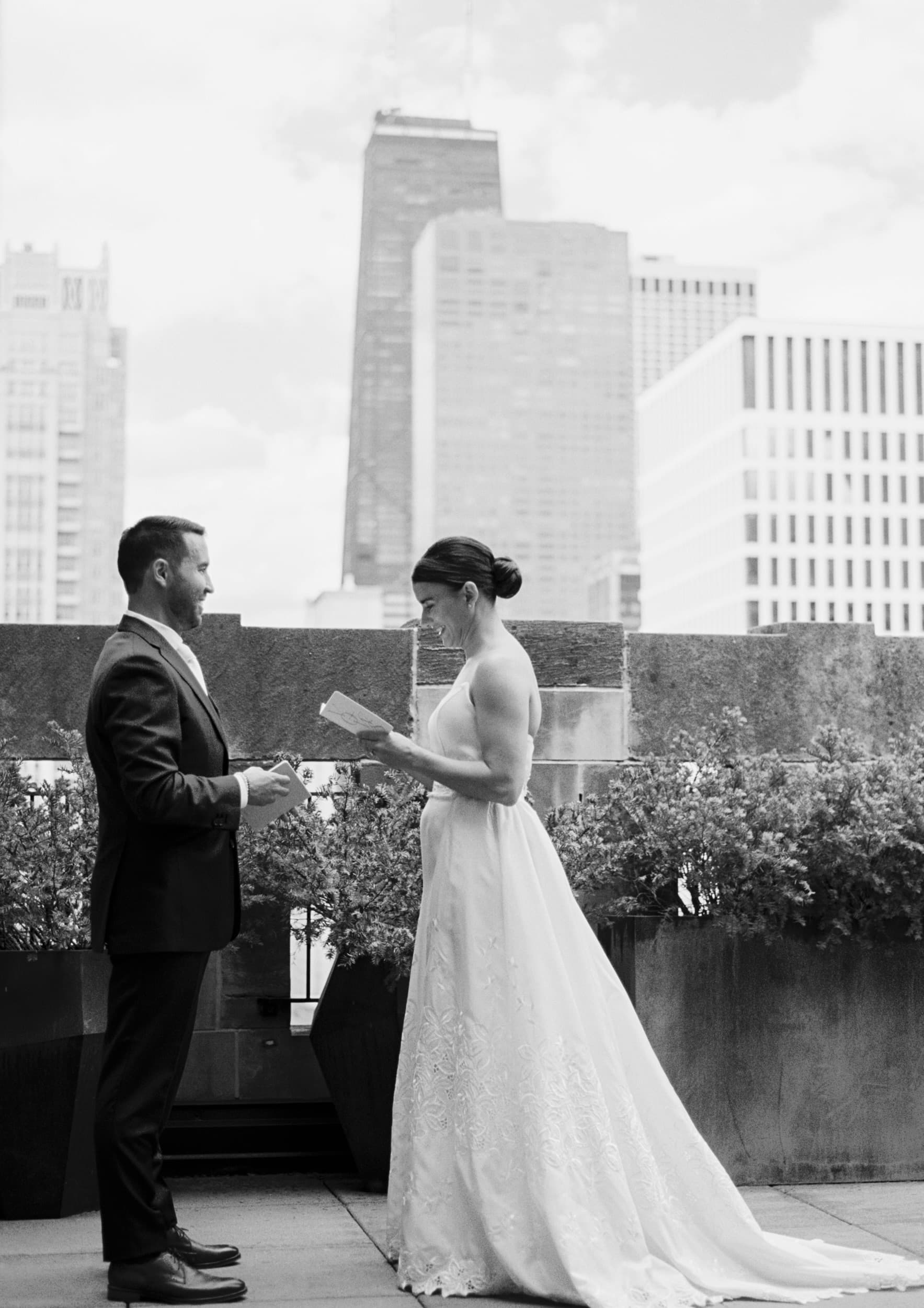 A black and white photo of a bride and groom