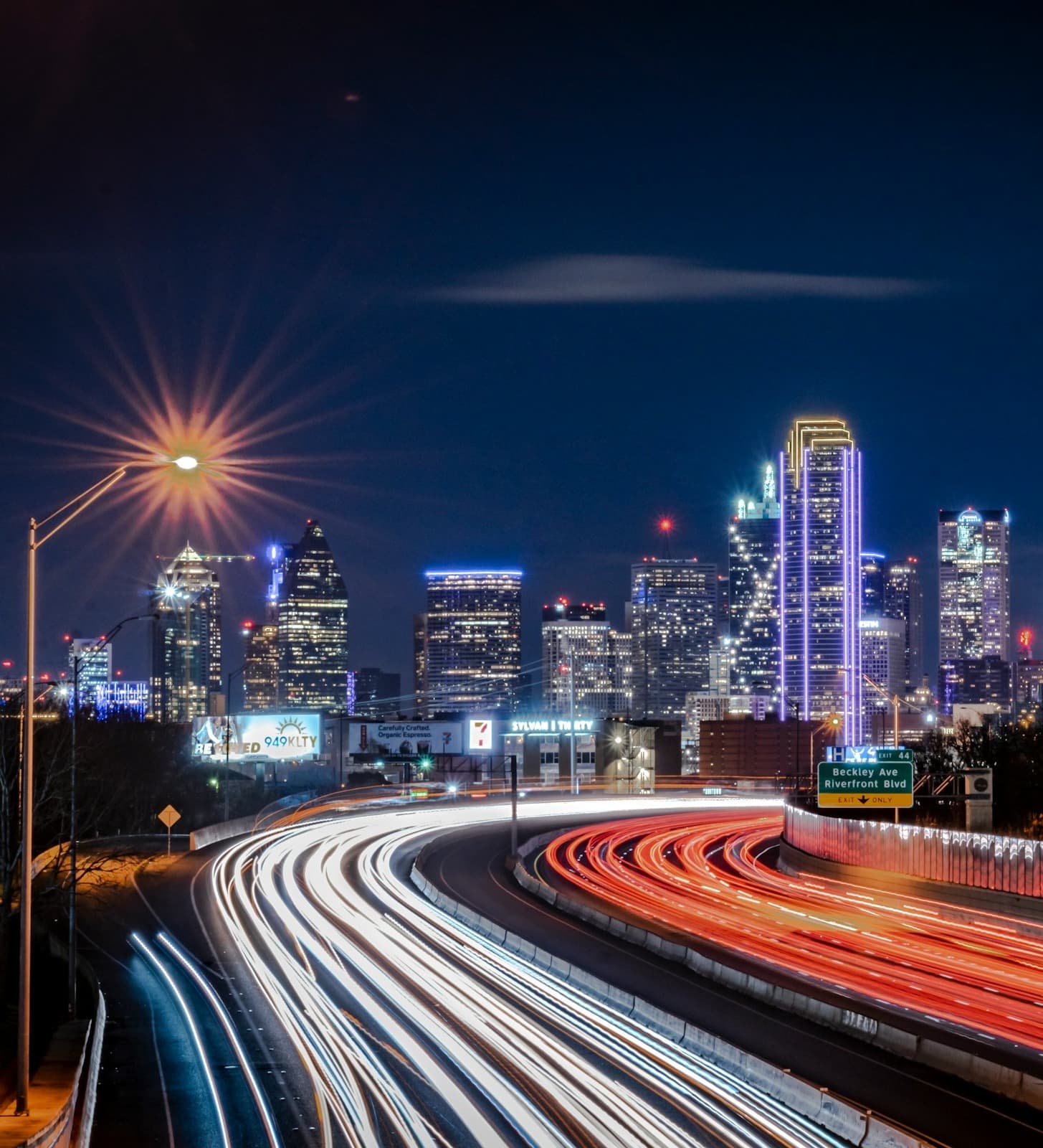 Time lapse photo of Downtown Dallas during night time.