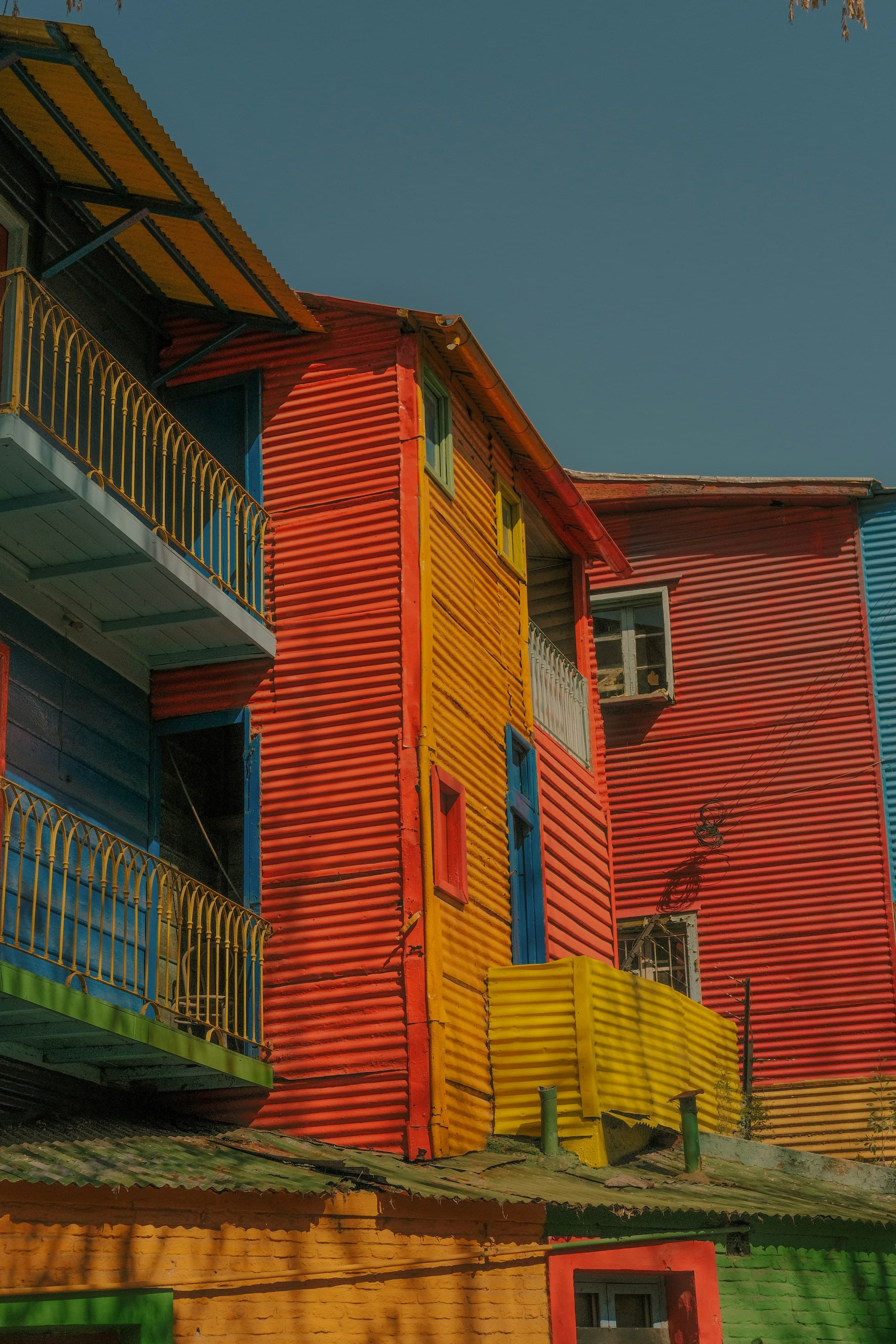 A row of multicolored houses can be found in La Boca.