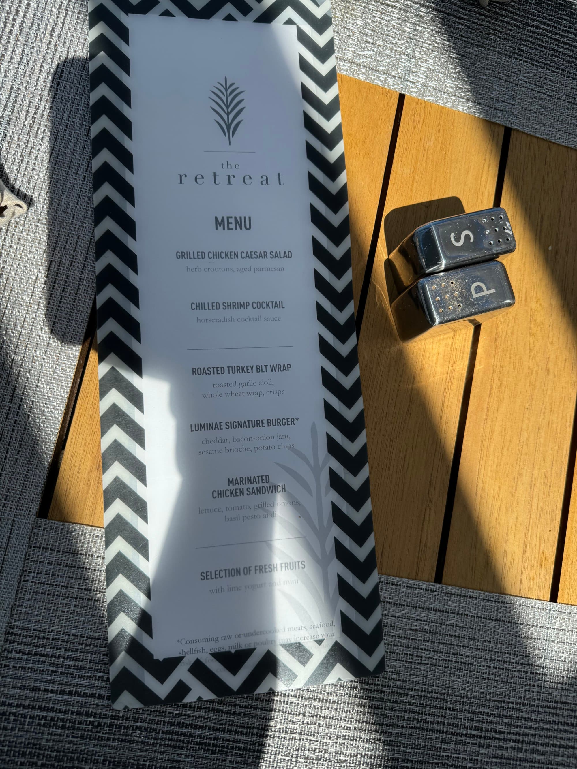 A black and white menu on a table