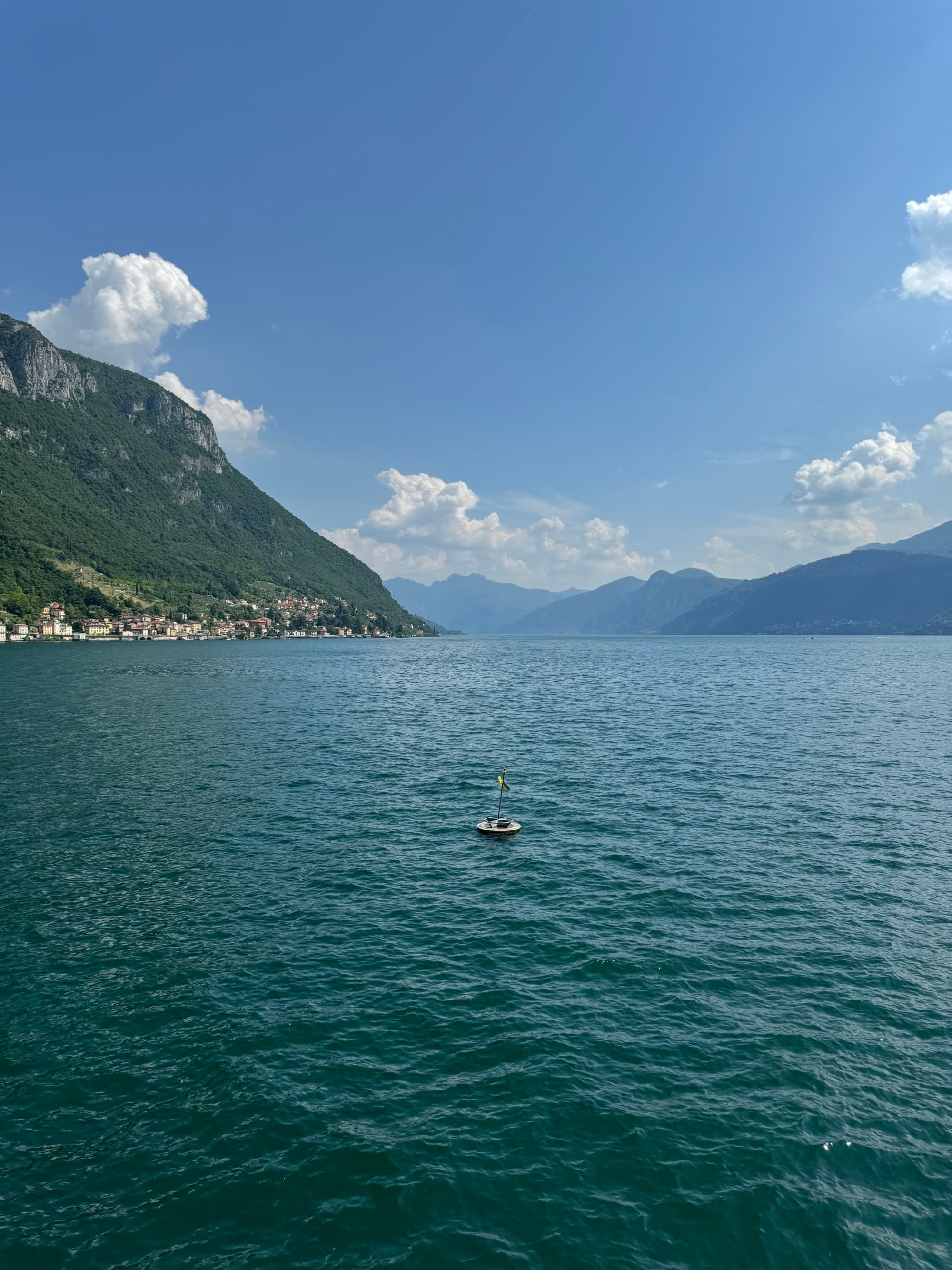 A lake view with mountains in the distance