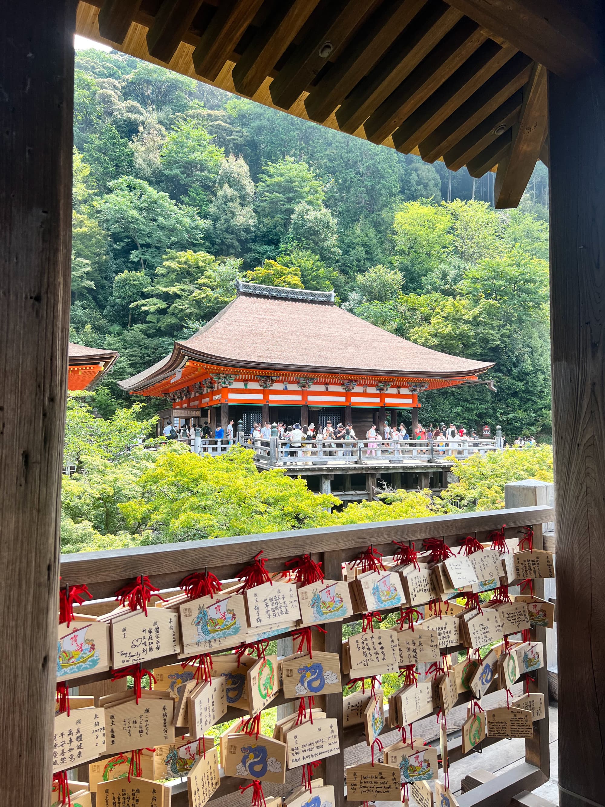 A Japanese temple nestled amongst trees.