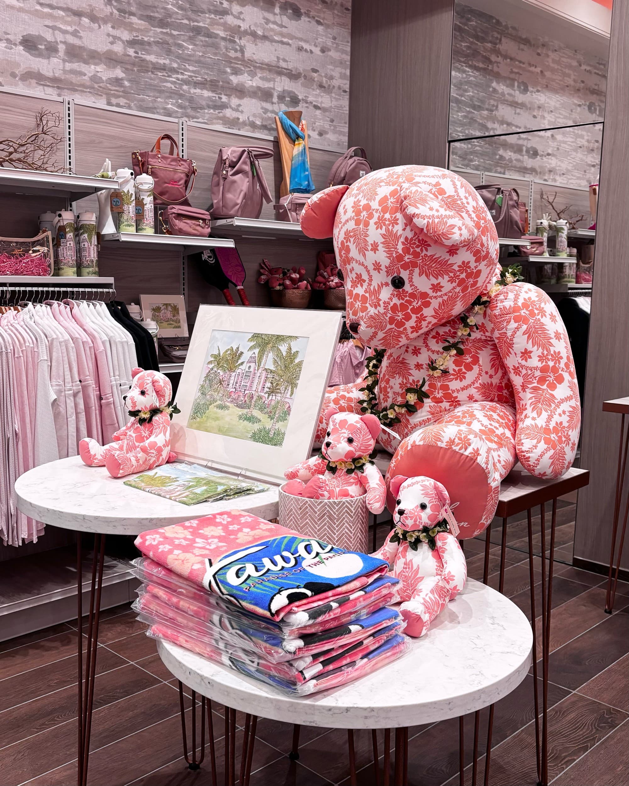 Boutique with pink teddy bears on display.