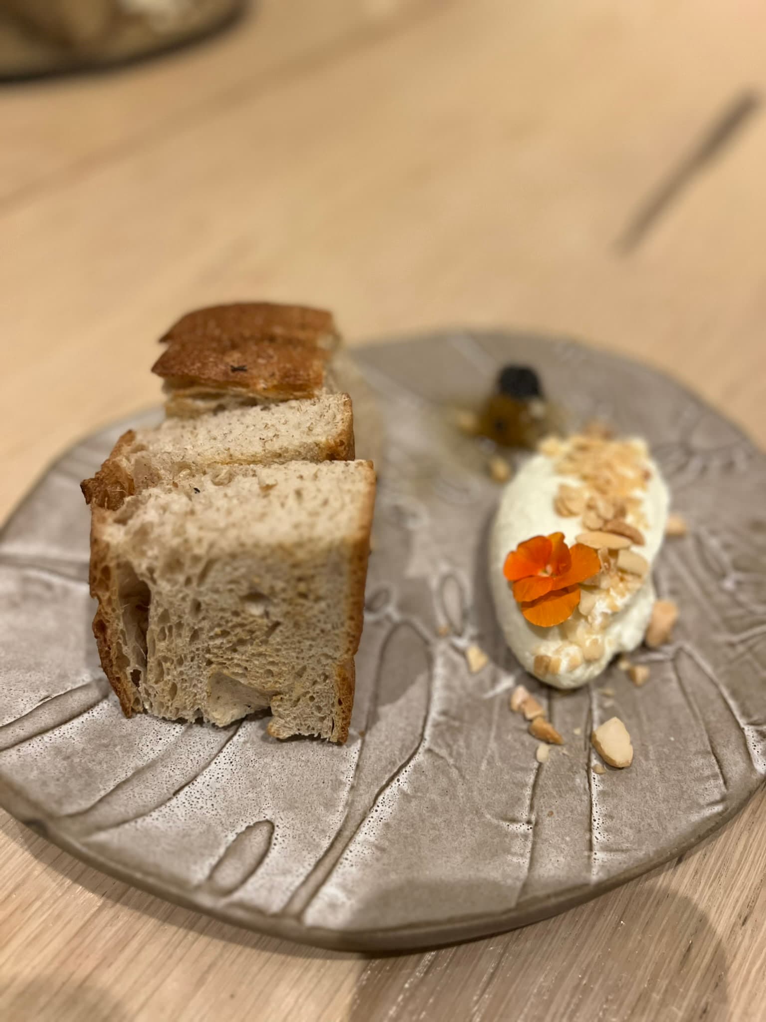 Food on a silver plate on a table