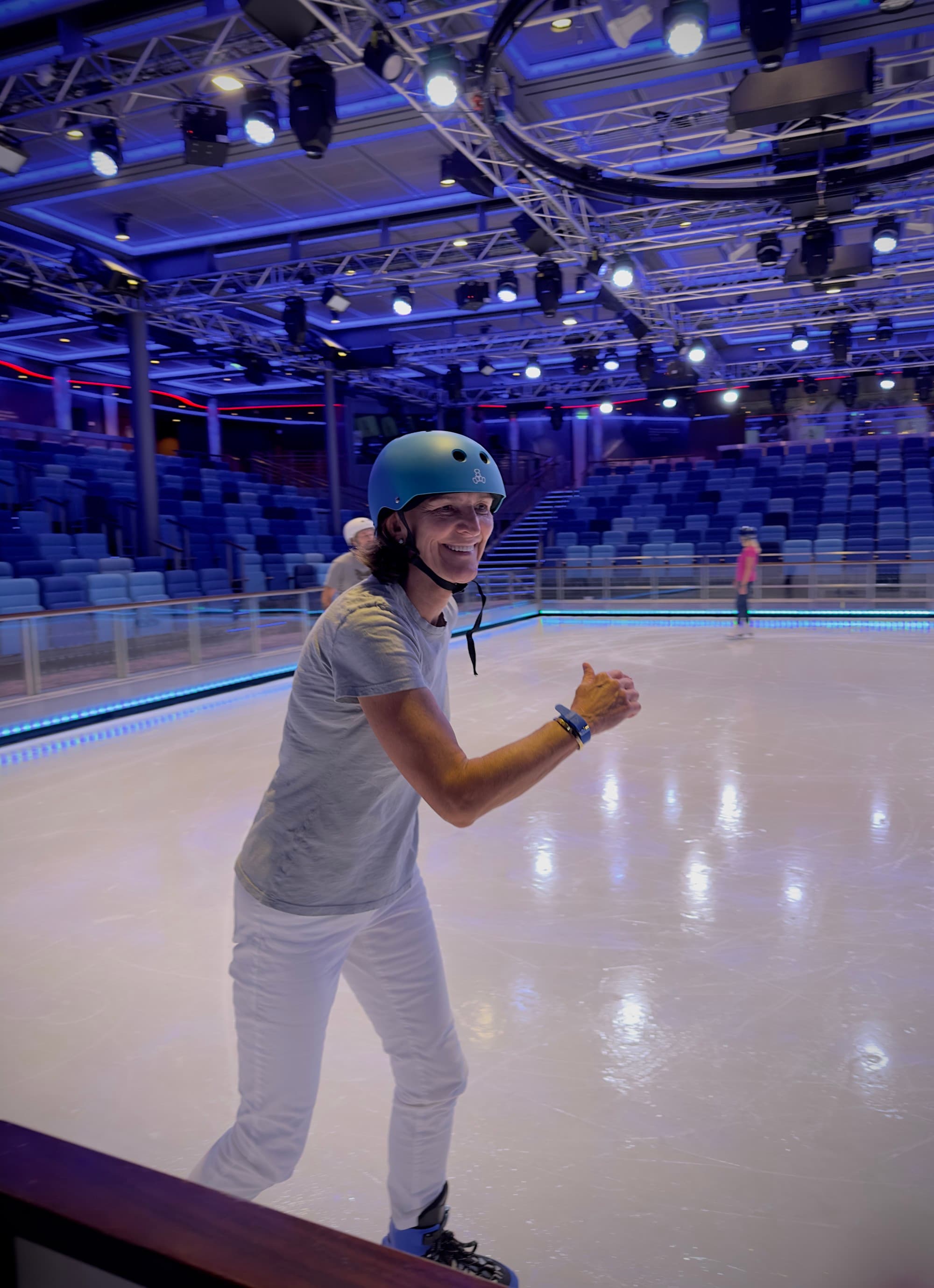 Ice Skating in Studio B with a large rink and overhead lights that create a disco feel.