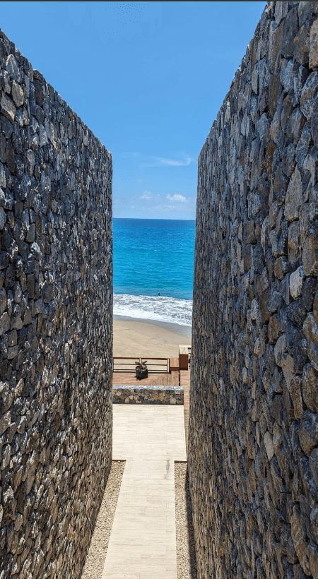 pathway to the sea through rocks