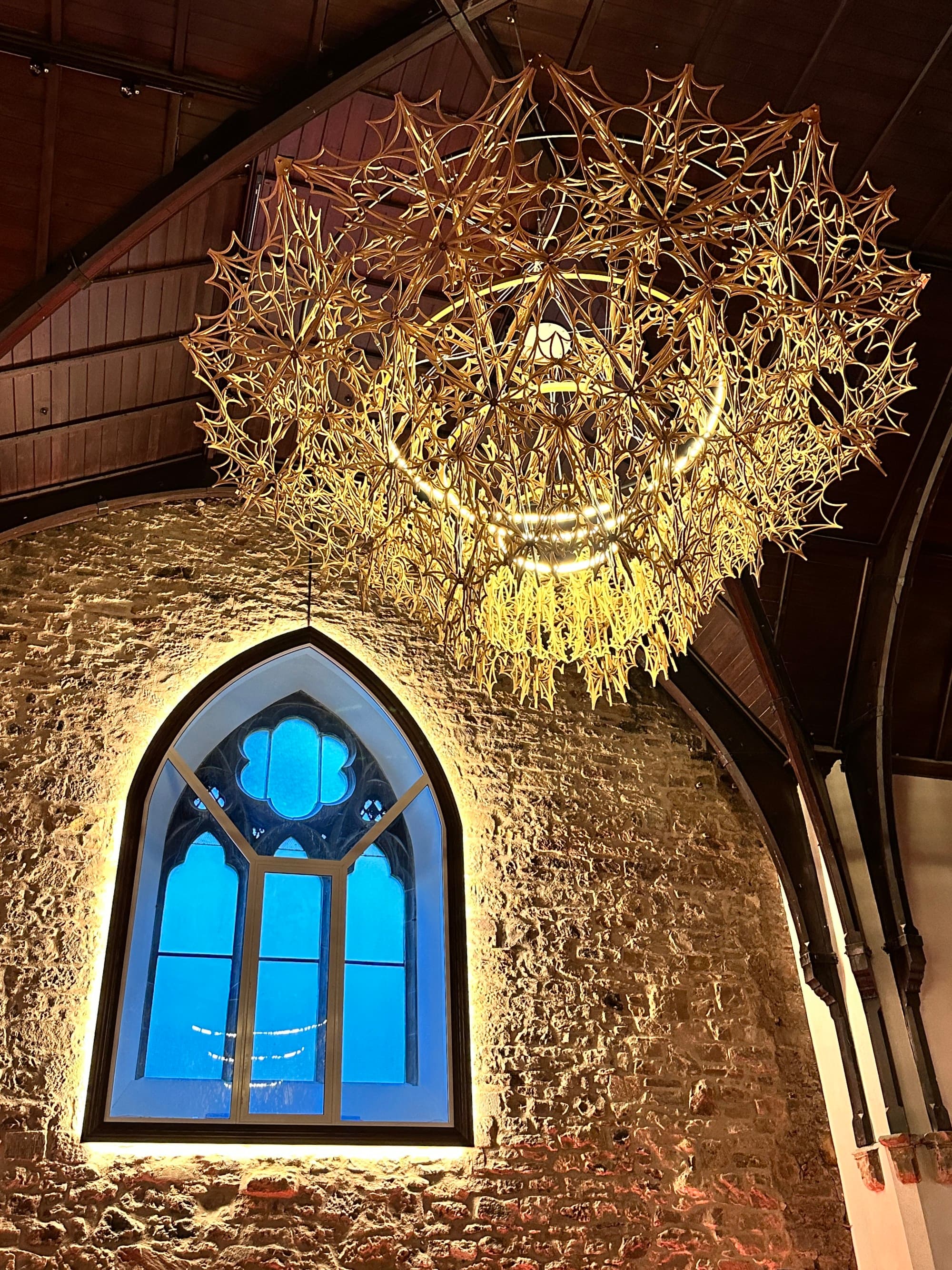 The venue, Chandelier, and a Stained glass window - Siane Chirpich