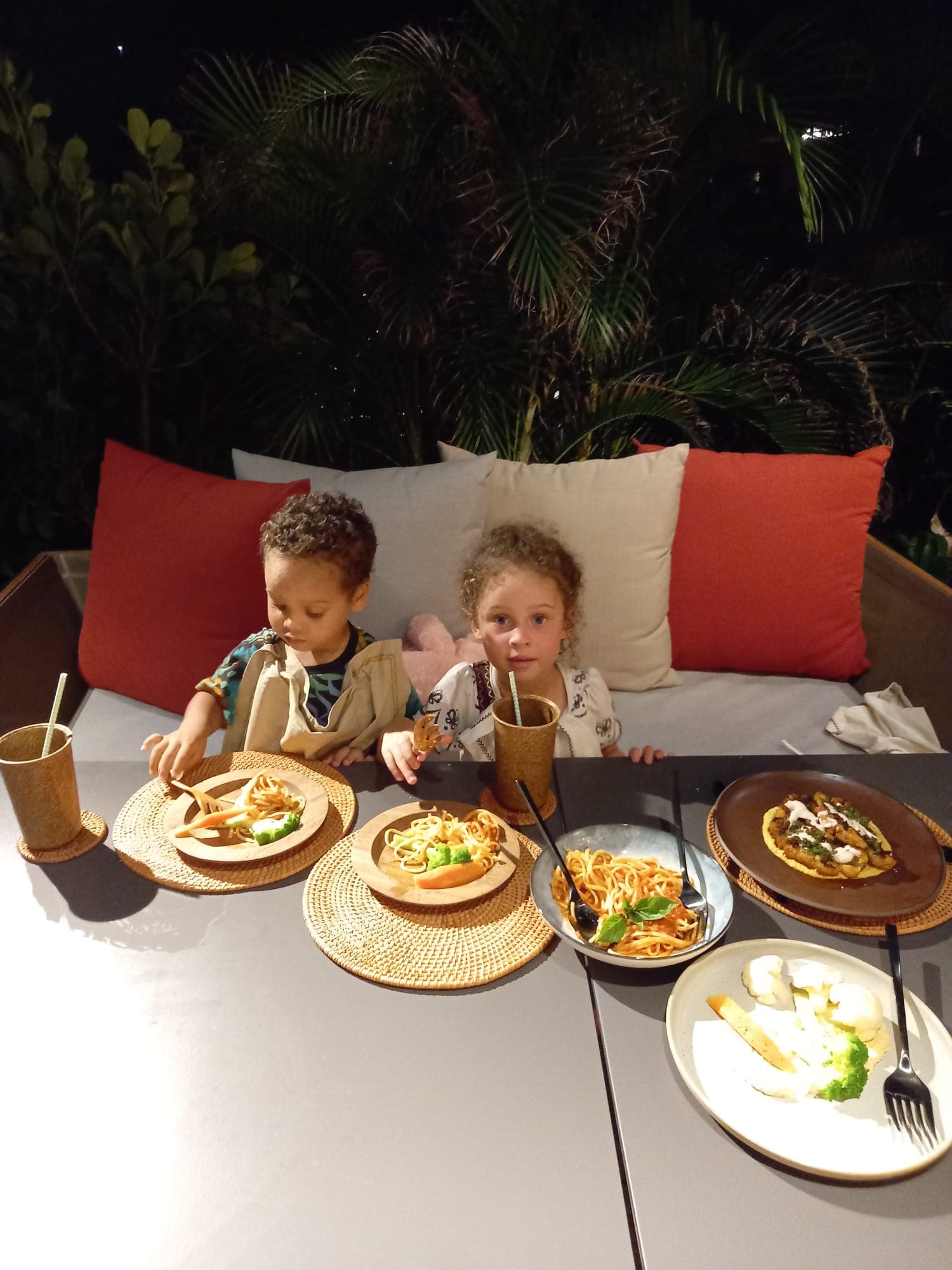 Kids enjoying their dinner