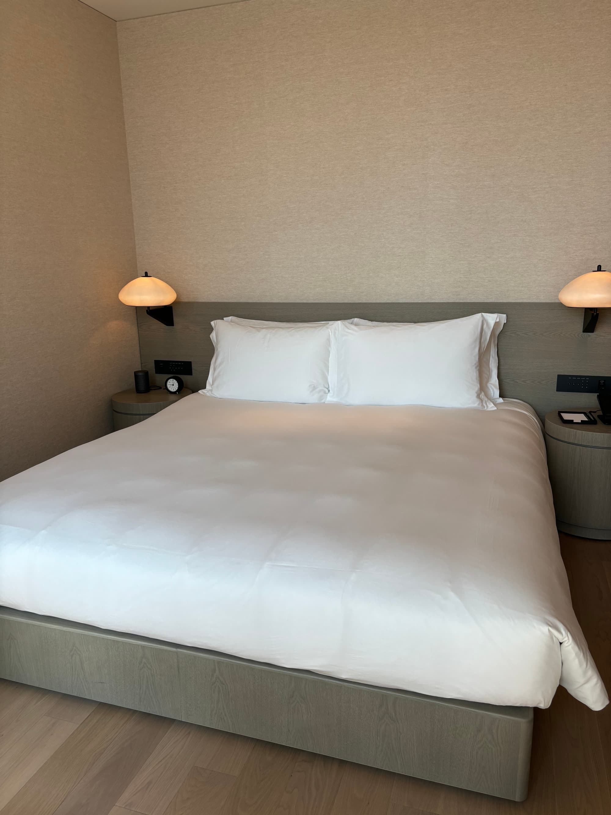 A large bed in a hotel room