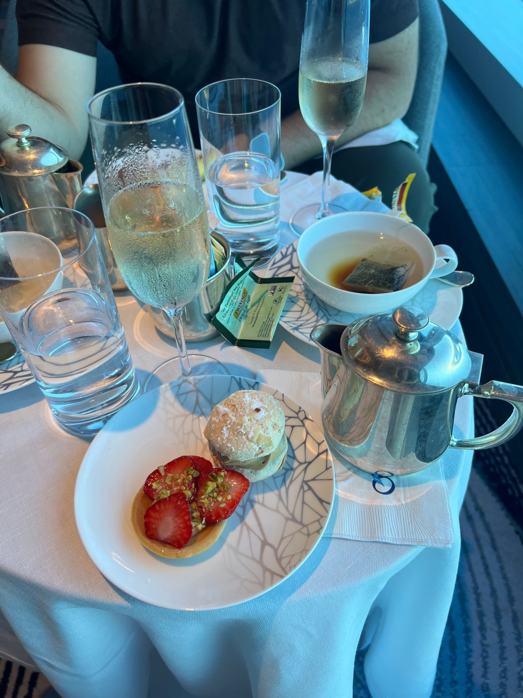 Glasses and plates on a small table