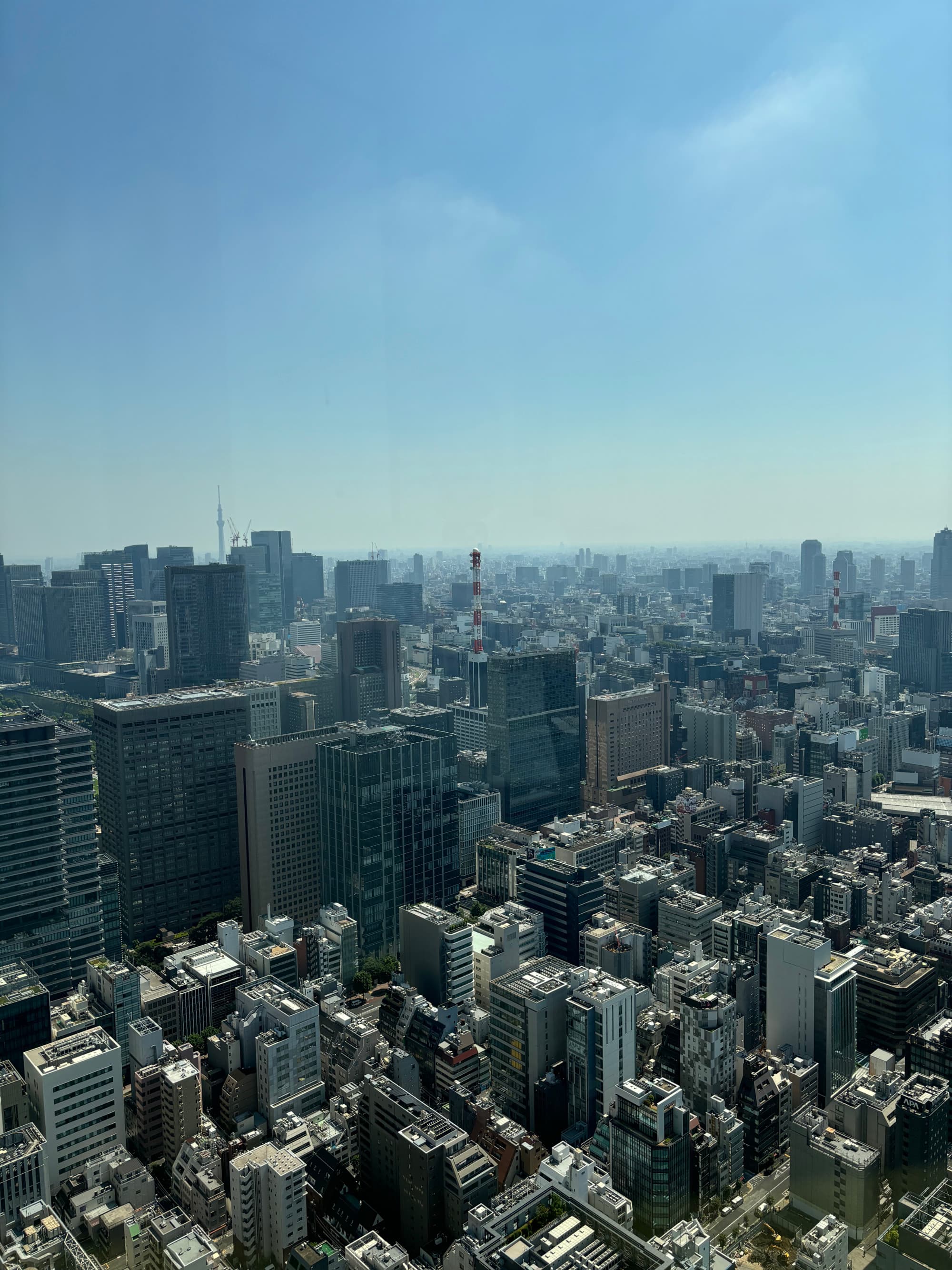 Aerial view of a city full of skyscraper buildings