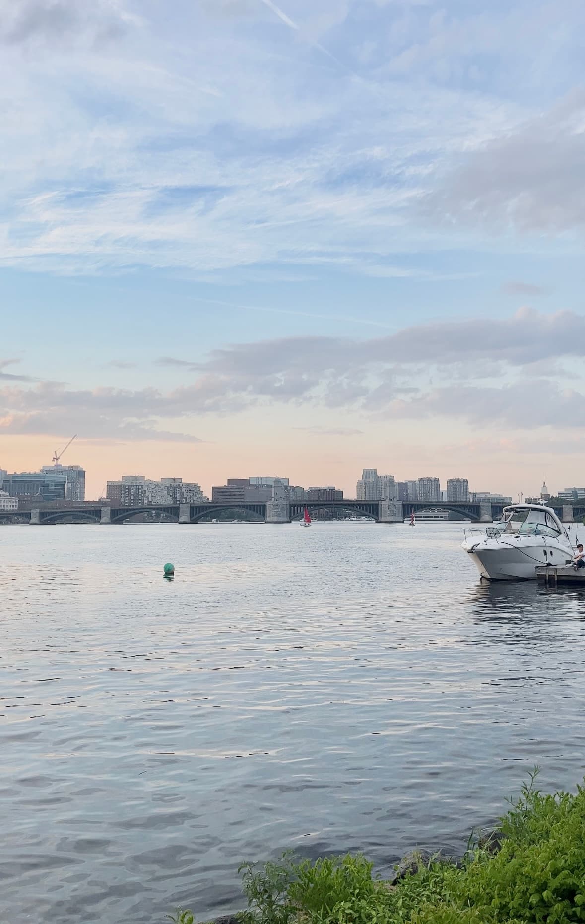 Sunset over river and Longfellow bridge in Boston