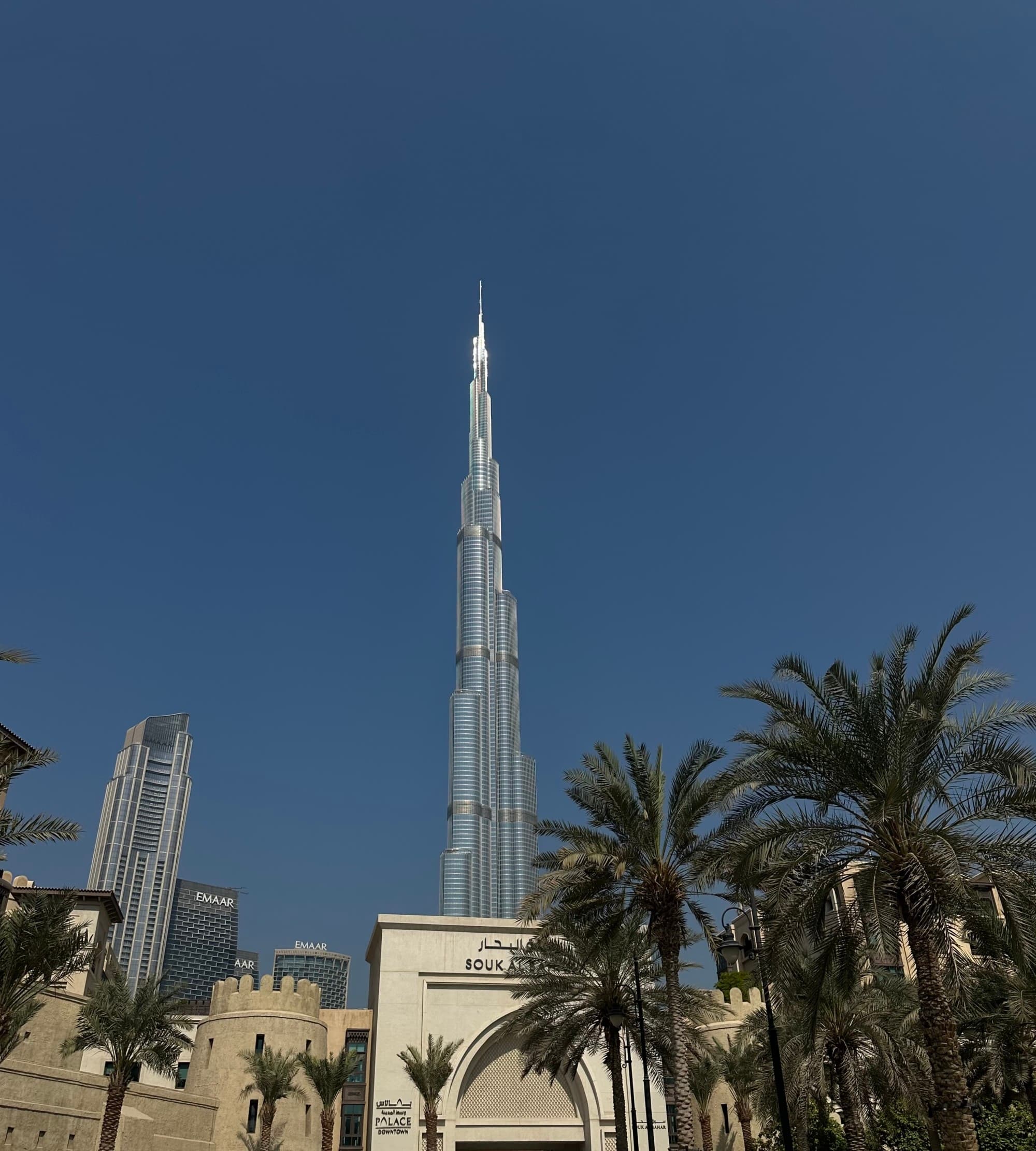 A low-abled view of a tall city building during the daytime