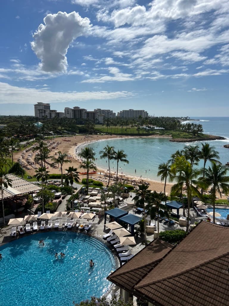 Aerial view of a beach and pool area during the daytime