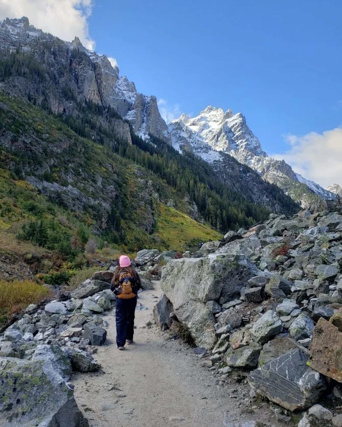 Wandering alone on a trail in the mountains