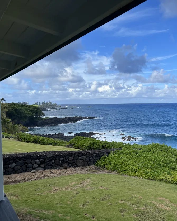 Looking at the beautiful view of the sea from a hotel balcony