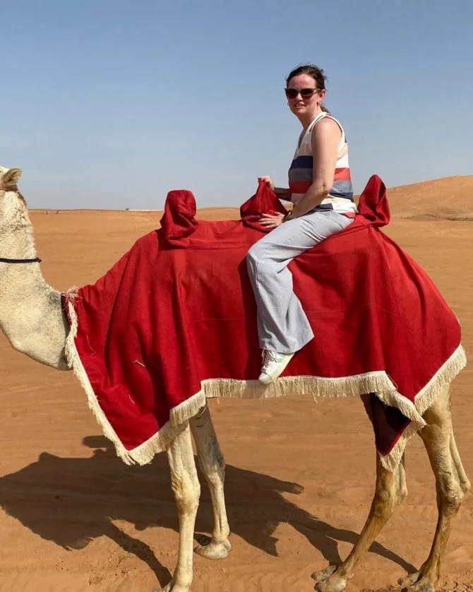 Taking a camel ride in the desert