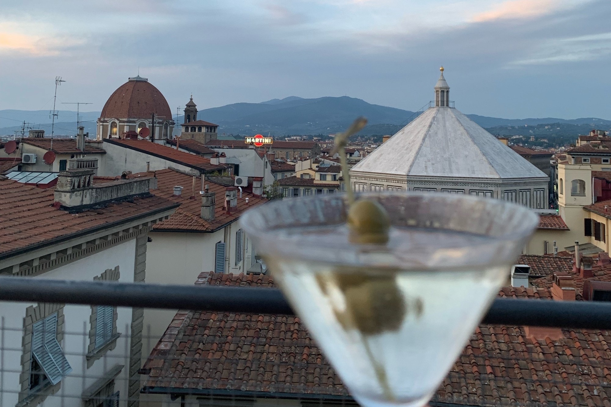 Wine glass on a balcony.