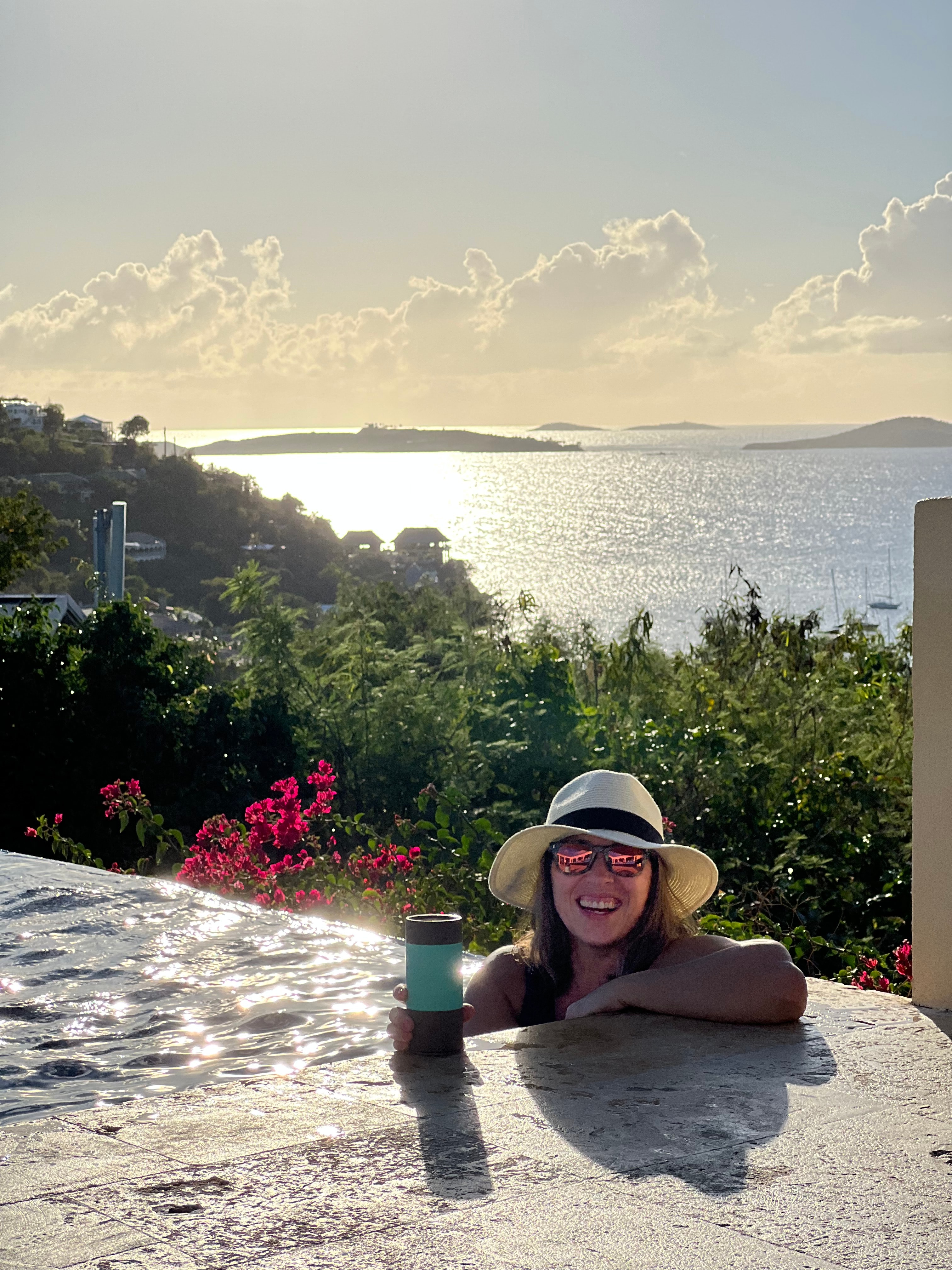 Audra posing beside sea