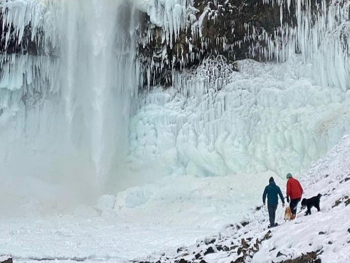 people on snowy mountain during daytime