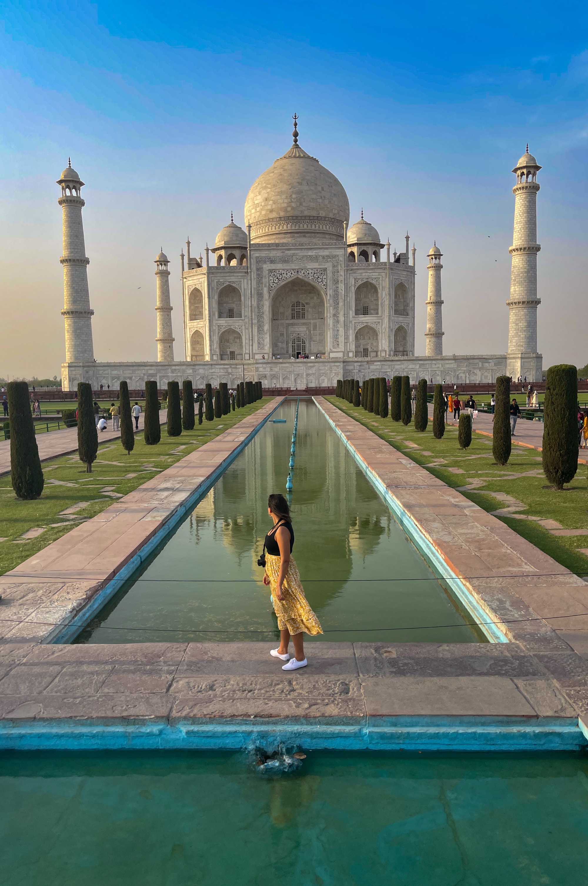 Travel advisor in front of the Taj Mahal.